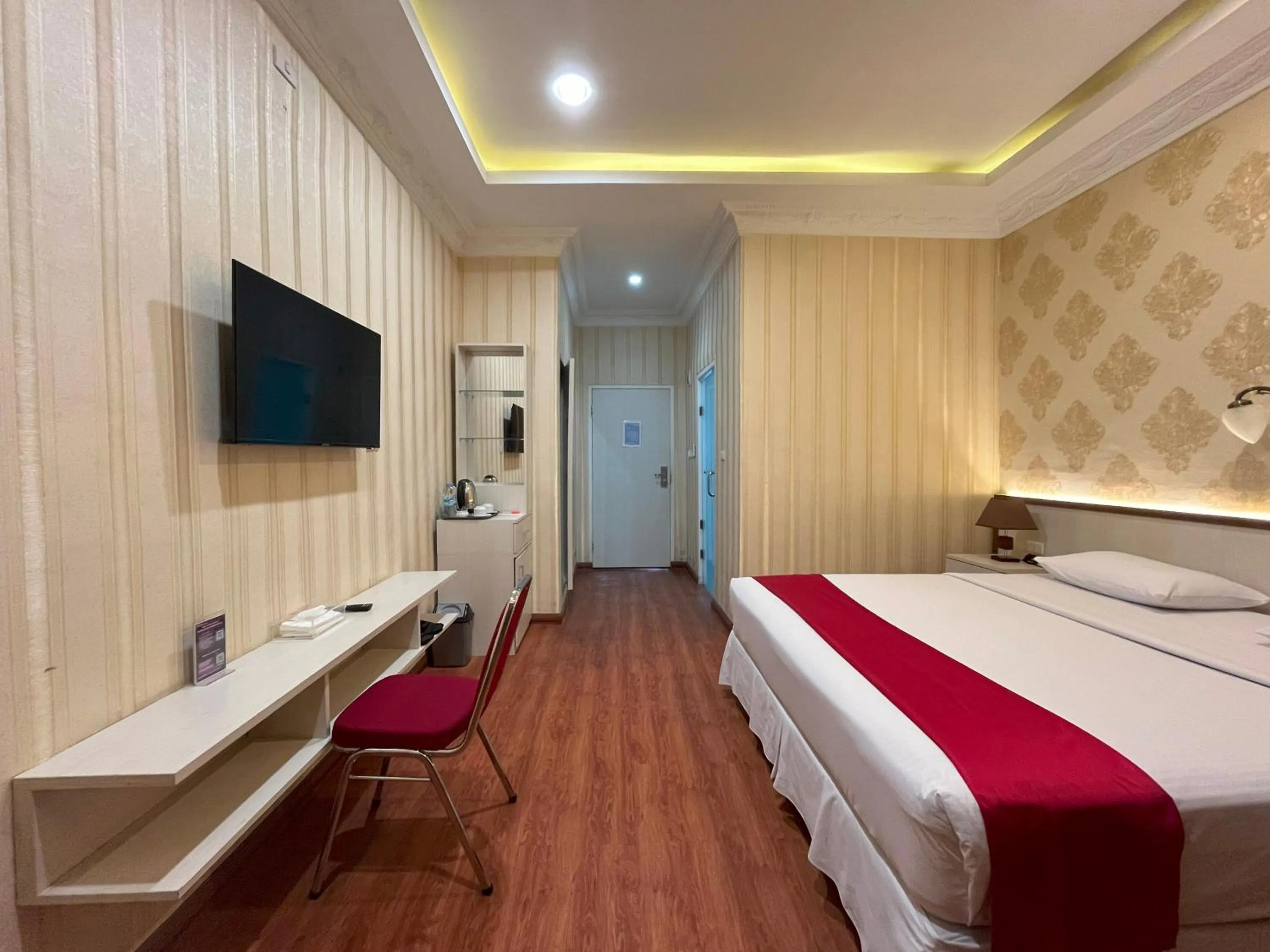 Bed in Grand Tamaro Hotel