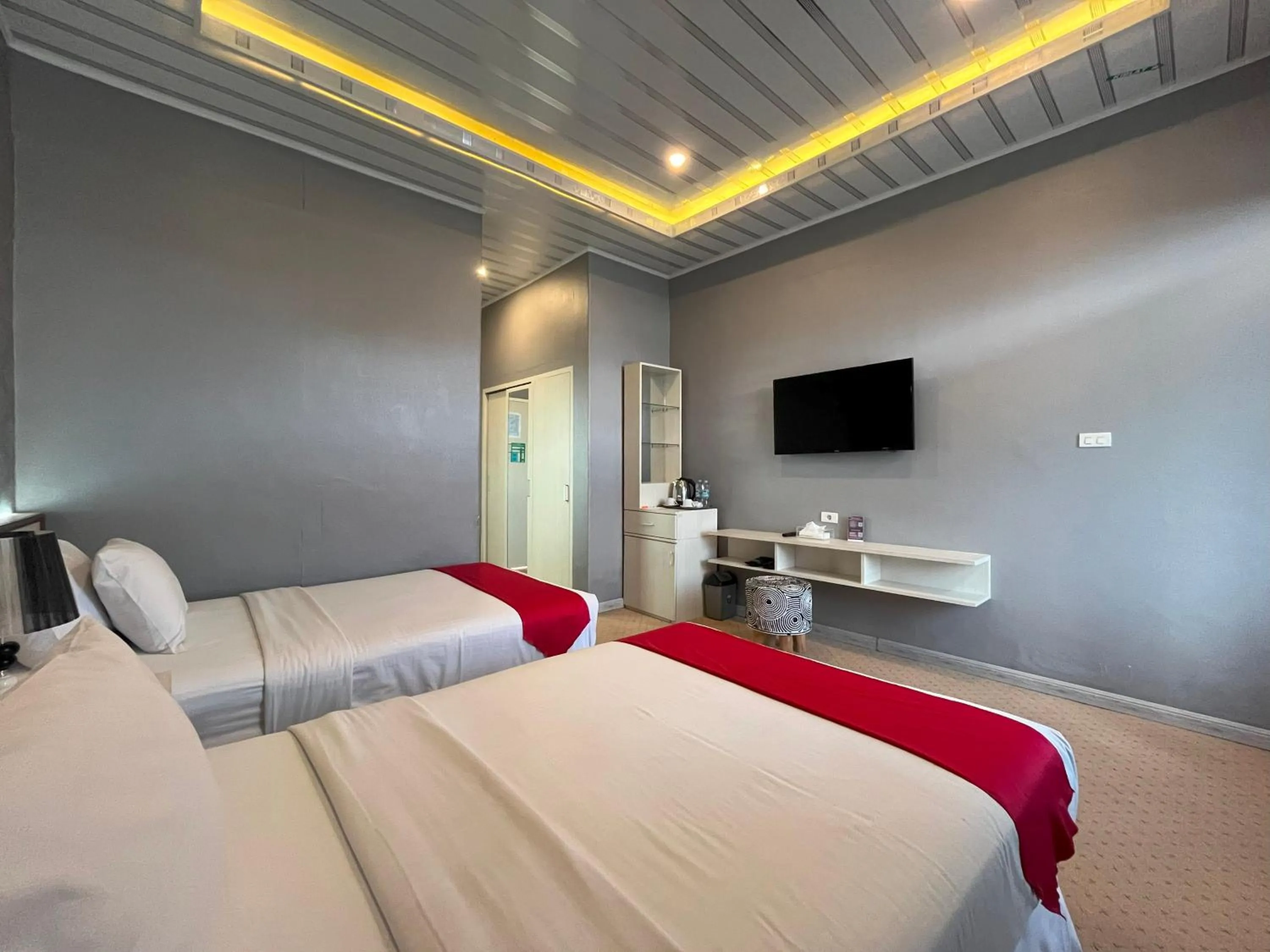 Bed in Grand Tamaro Hotel