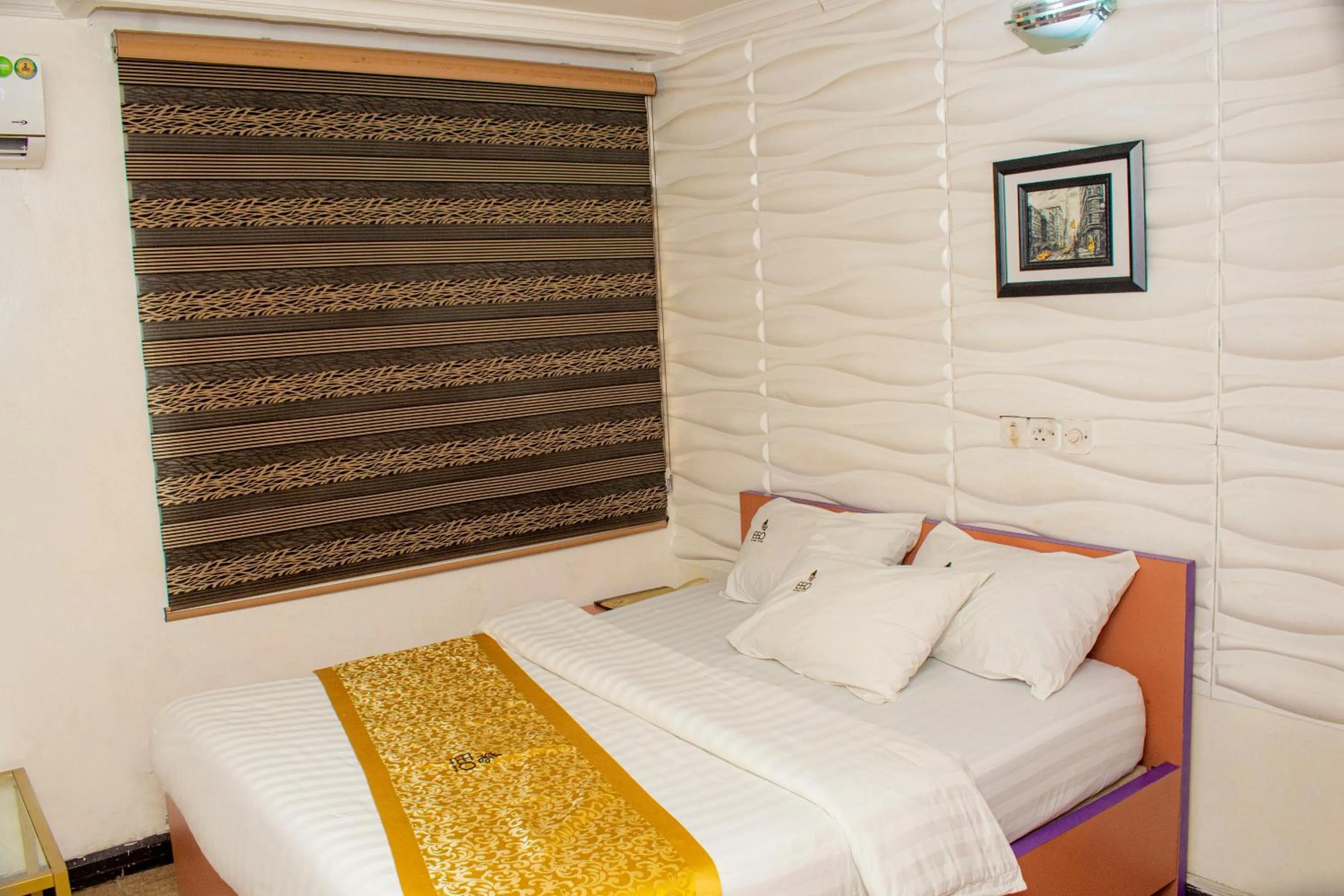 Bed in EED Pension Boutique Hotel