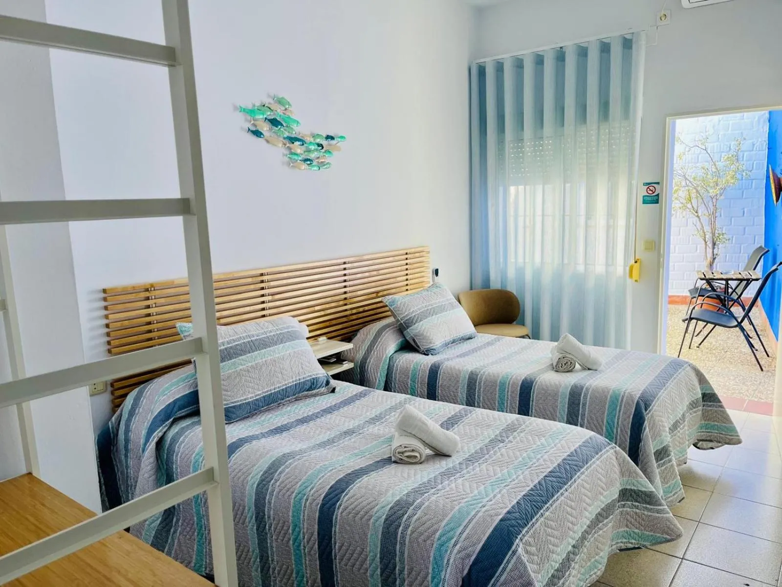 Bed in Hostal El Faro
