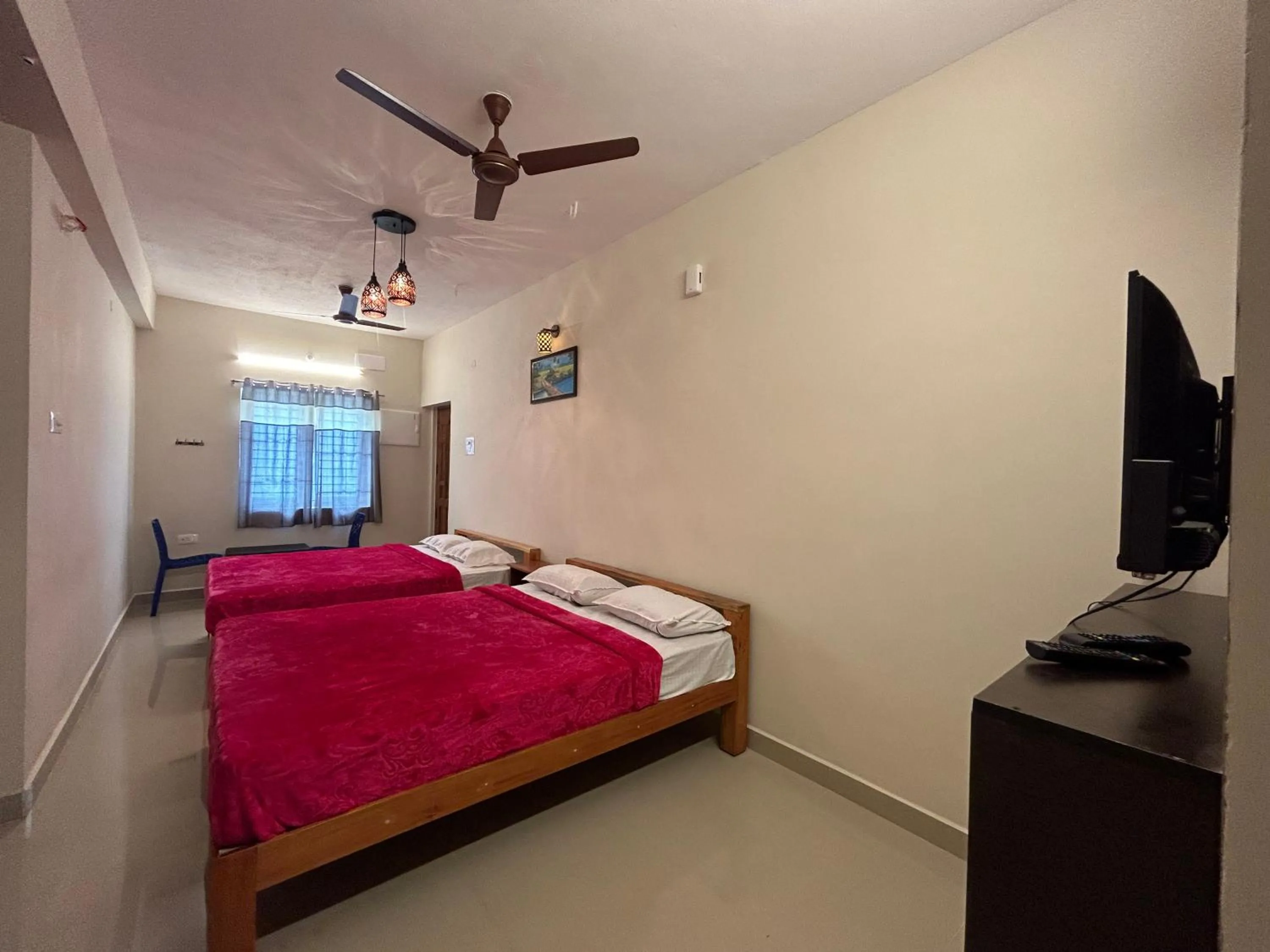 Bed in Aarudra's Residency Srirangam