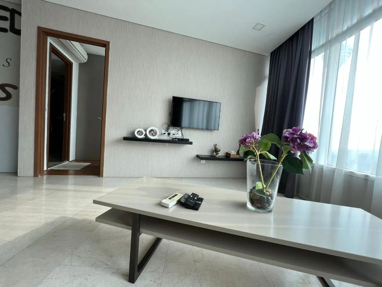 Communal lounge/ TV room in Vortex Suites KLCC City Center