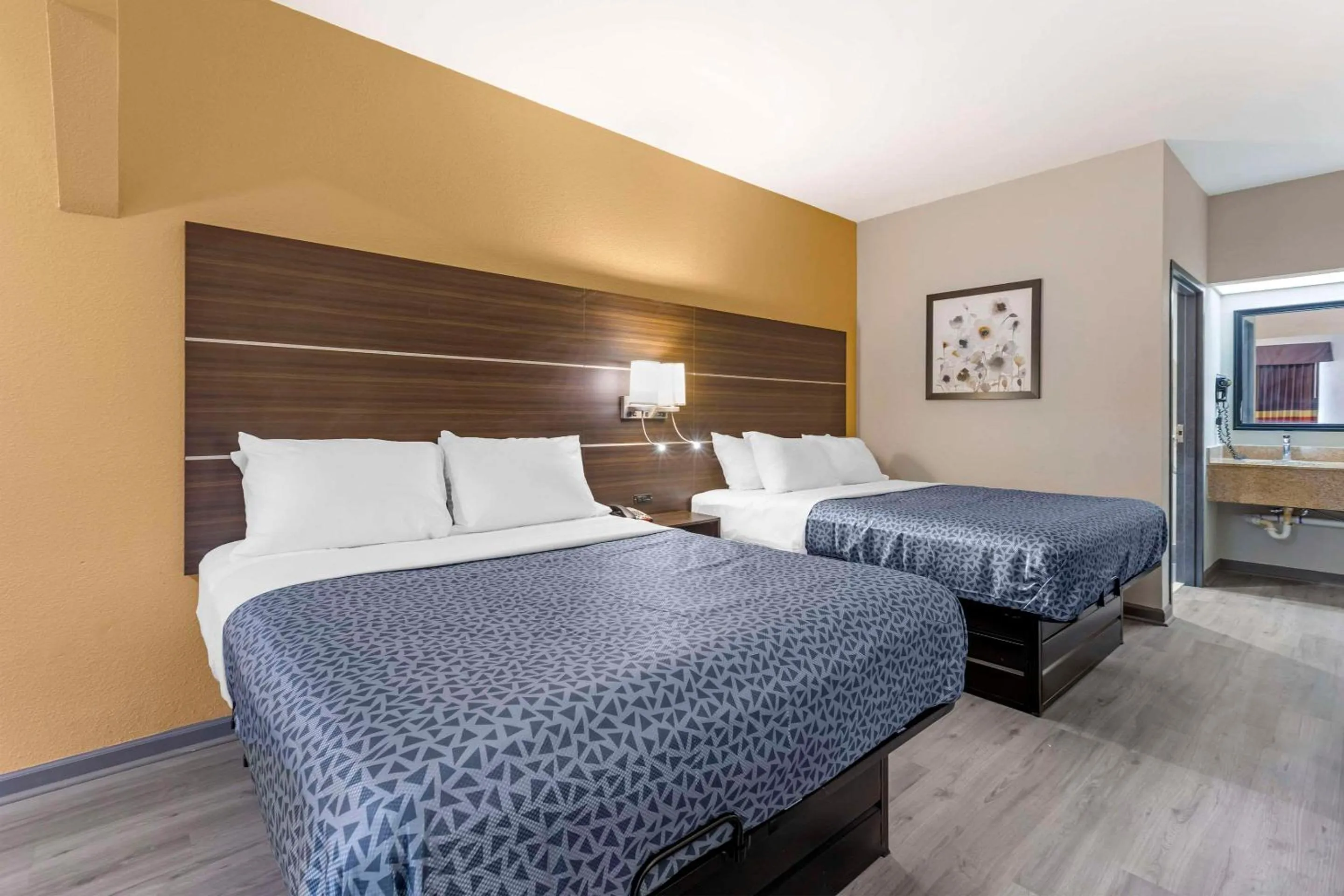 Bedroom, Bed in Suburban Studios Orangeburg