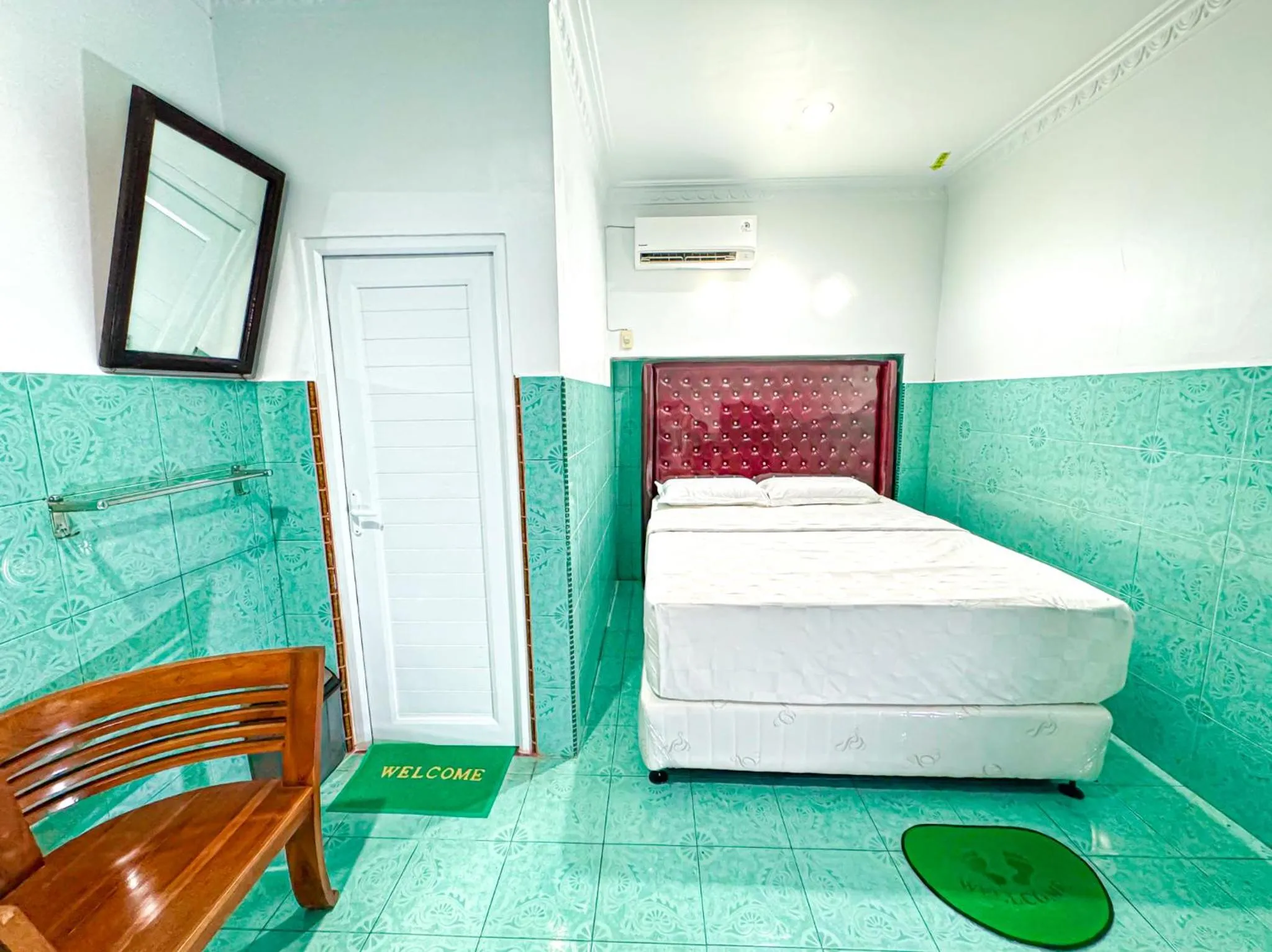 Bed in Hotel Grand Bandara