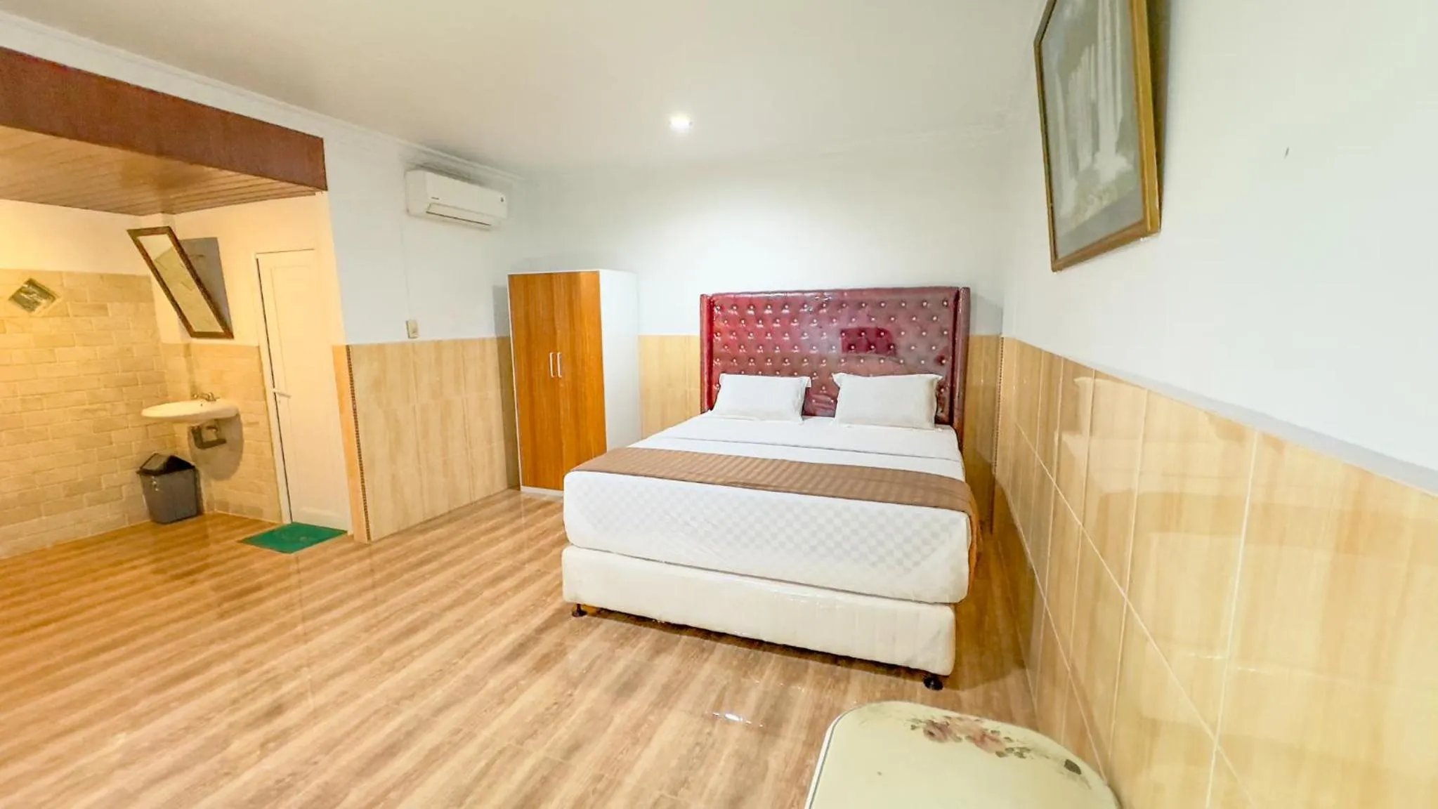 Bed in Hotel Grand Bandara