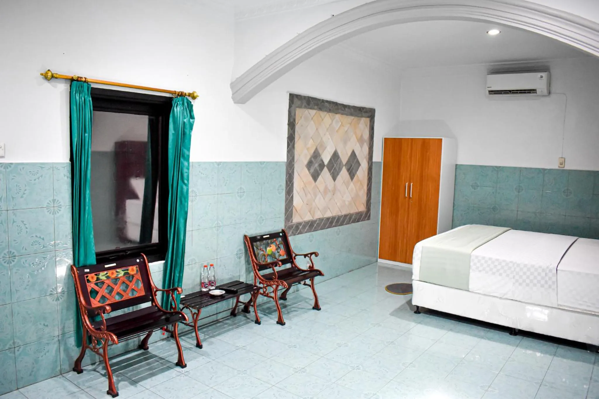 Bed in Hotel Grand Bandara