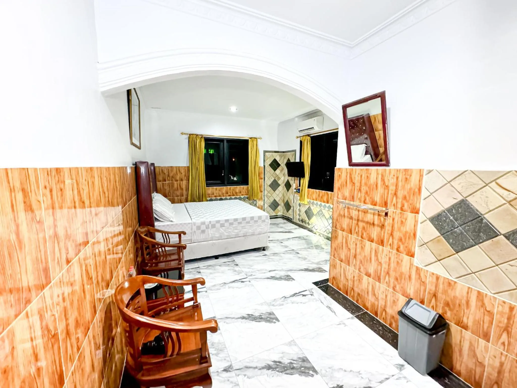 Bed in Hotel Grand Bandara