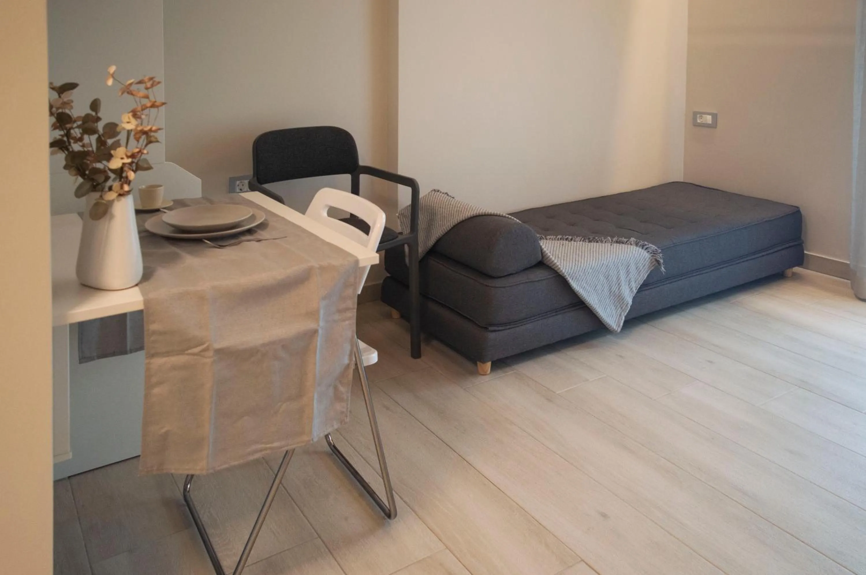 Seating area, Bed in AK Apartments Ioa