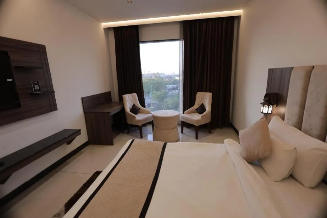 Bed in SNJ Taj Grand
