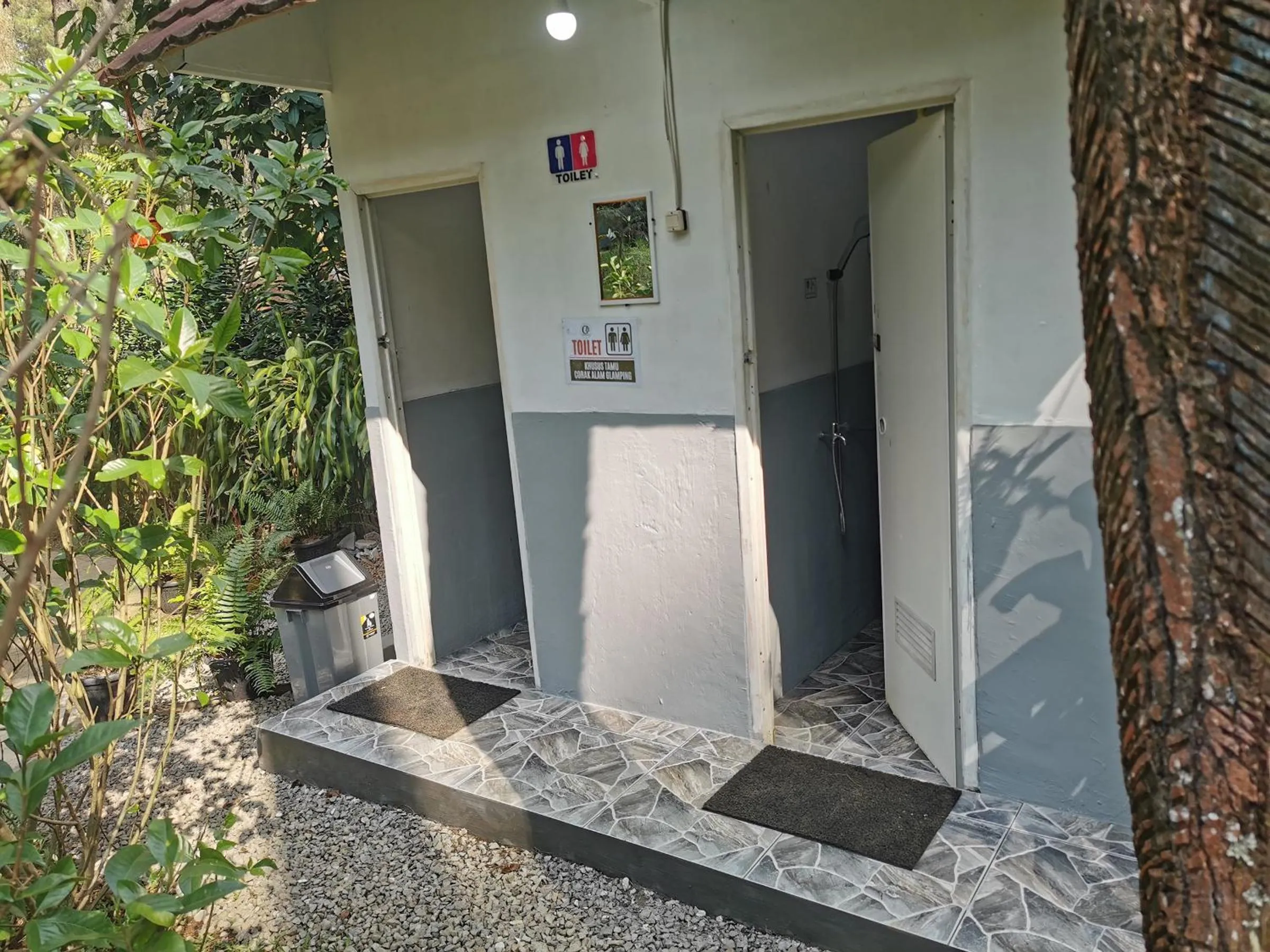 Bathroom in corak alam glamping