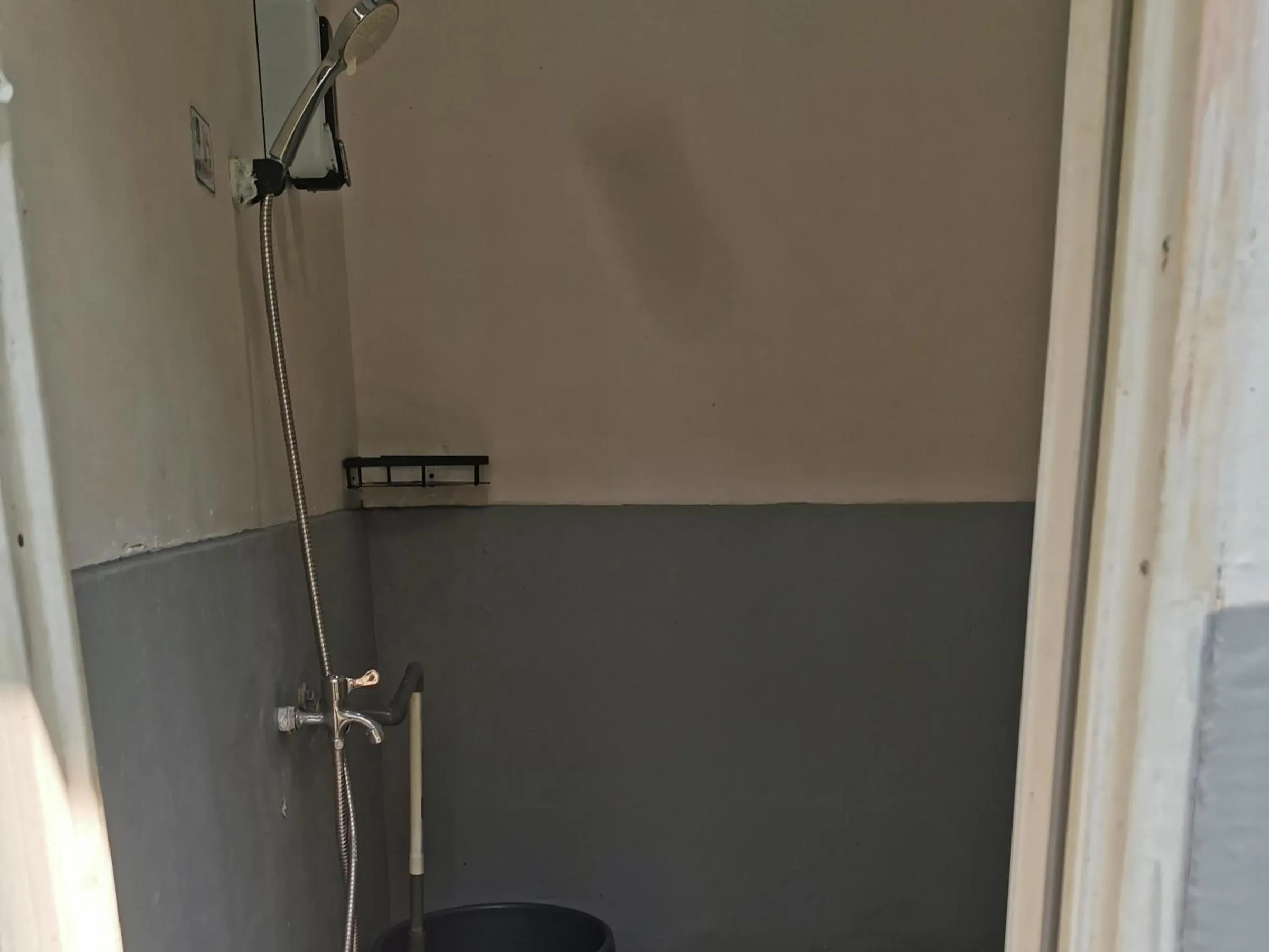 Bathroom in corak alam glamping