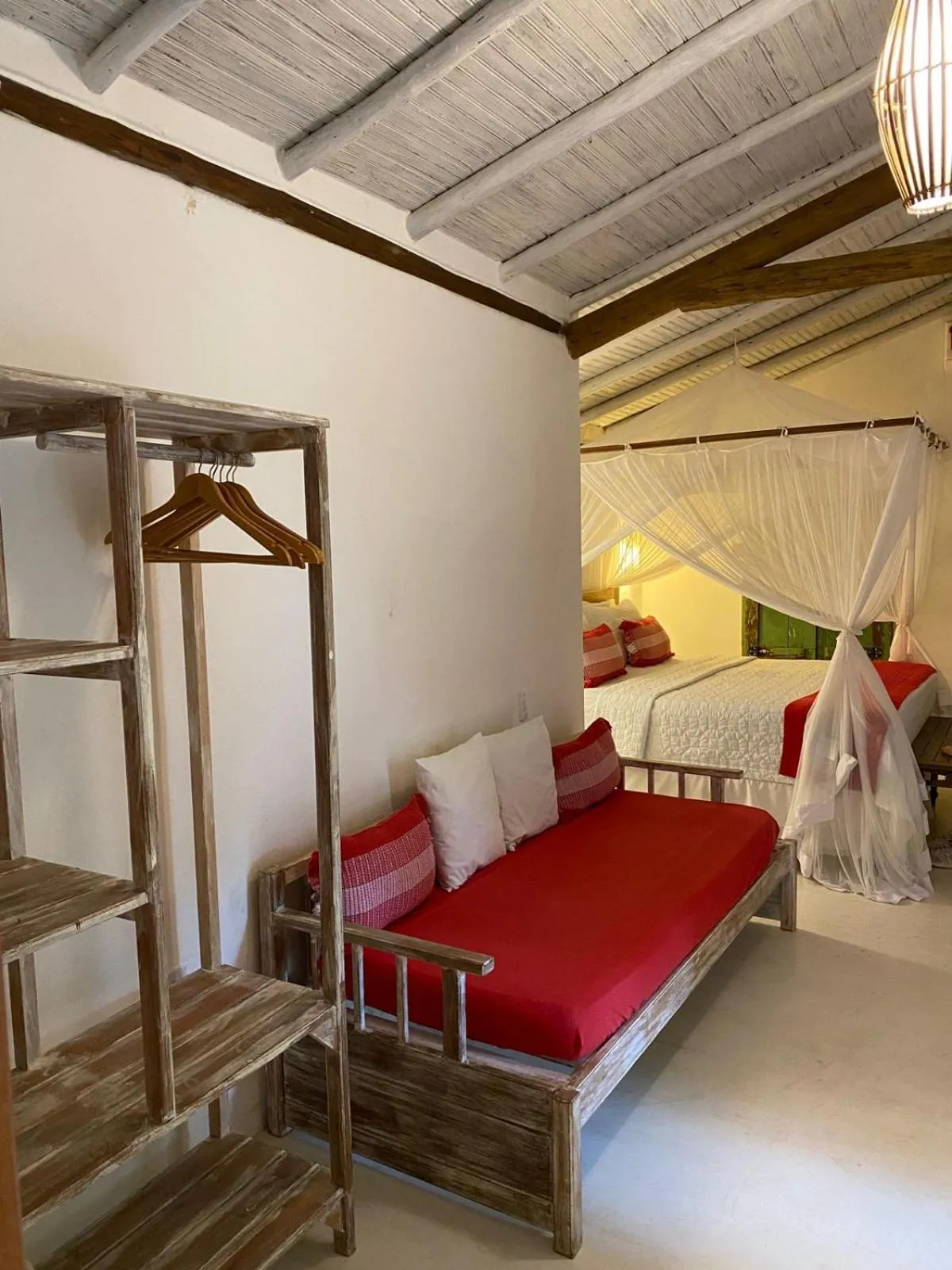 Bed in Pousada Hibisco