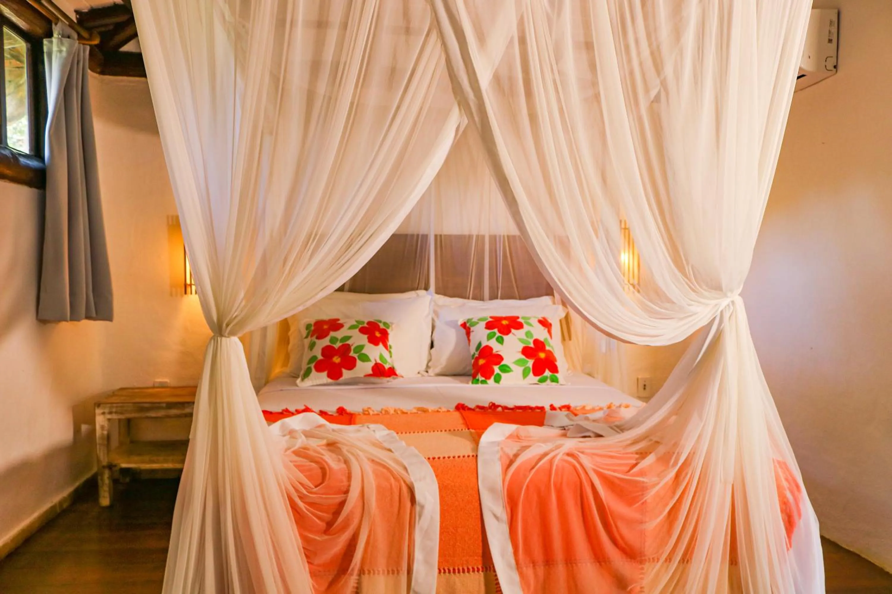 Bed in Pousada Hibisco