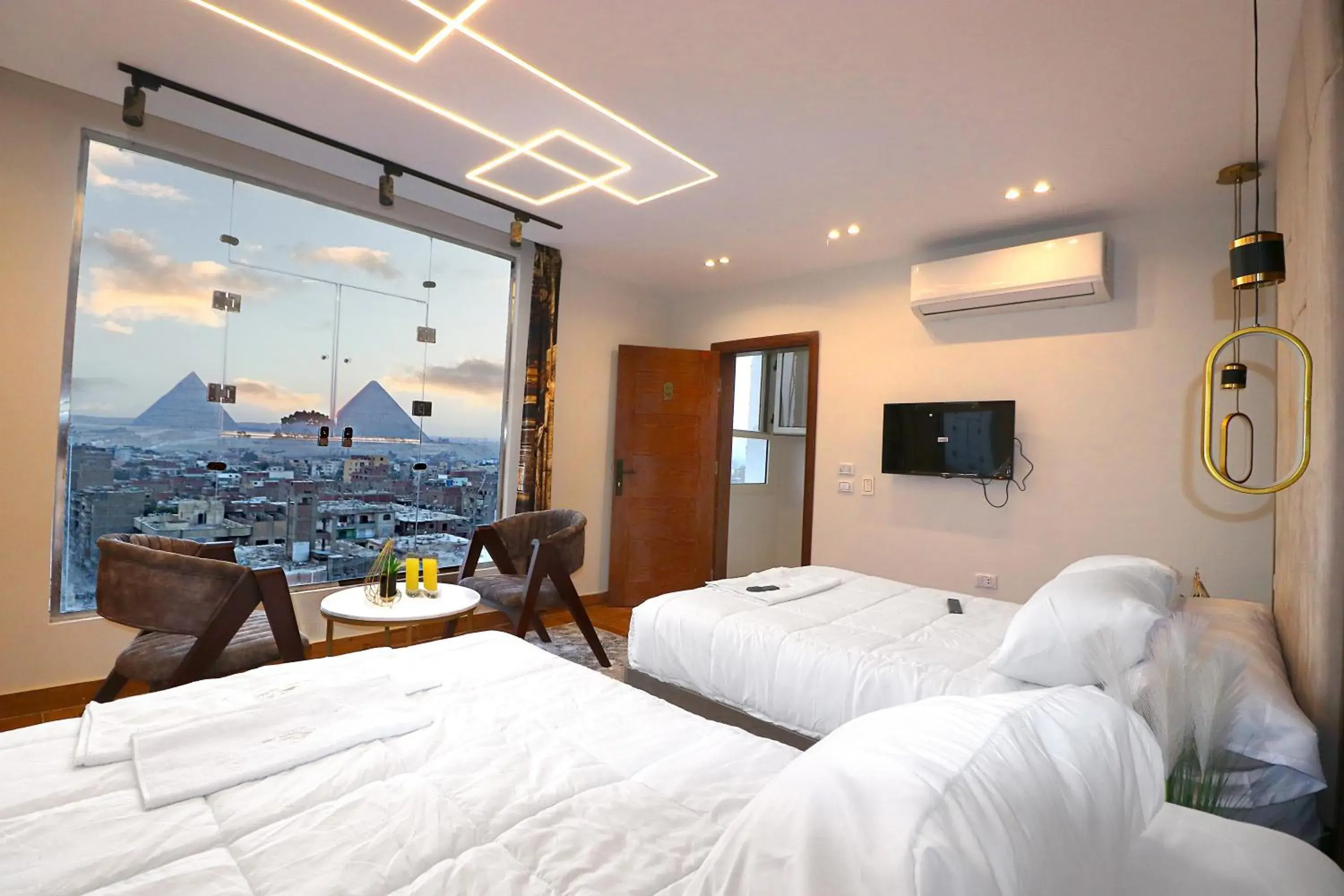 Luxury Quadruple Room in Pyramids Skyline Hotel Cairo Luxury Quadruple Room in Pyramids Skyline Hotel Cairo