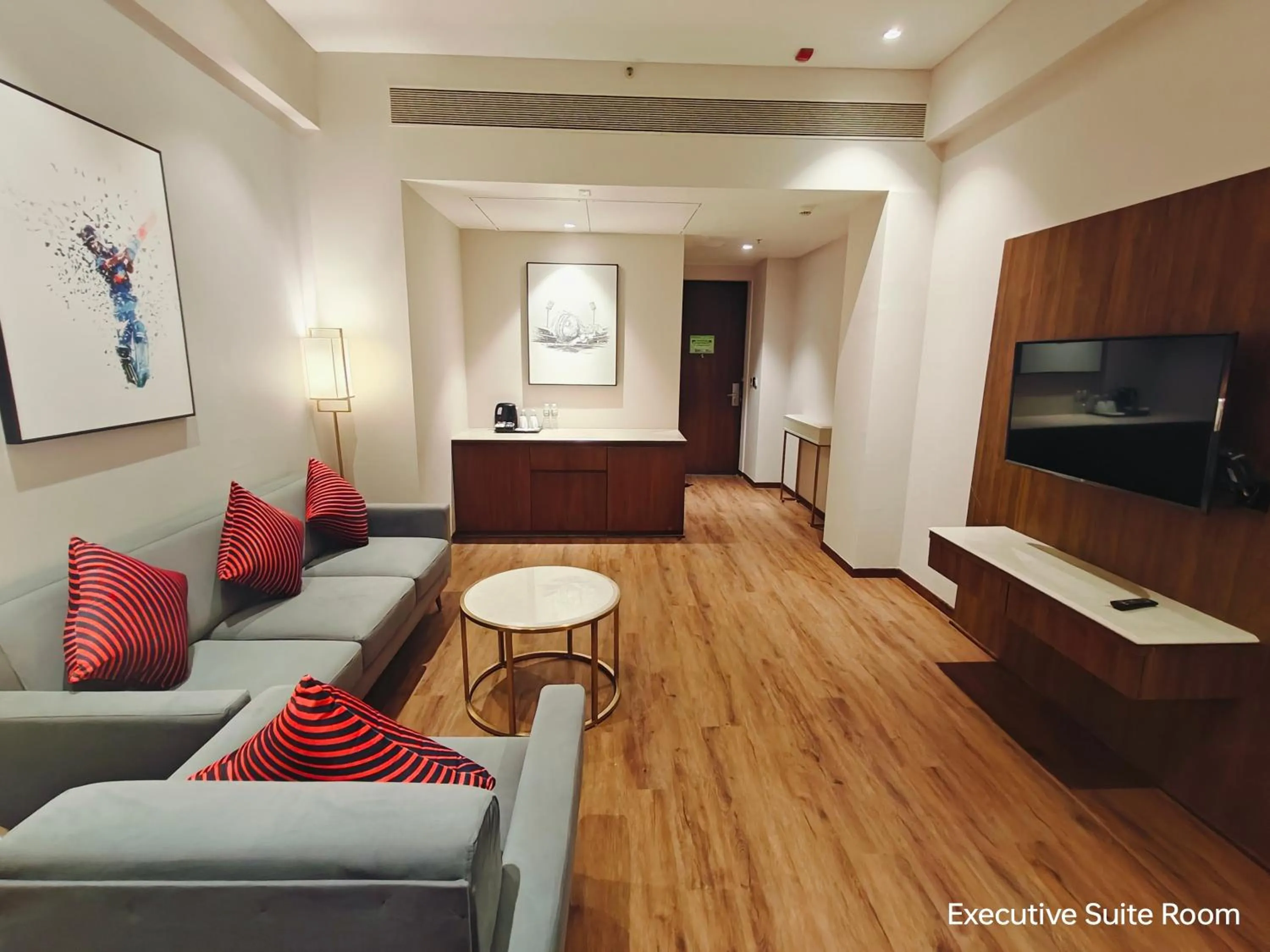 Living room in Ramada by Wyndham Ahmedabad Narendra Modi Stadium Motera