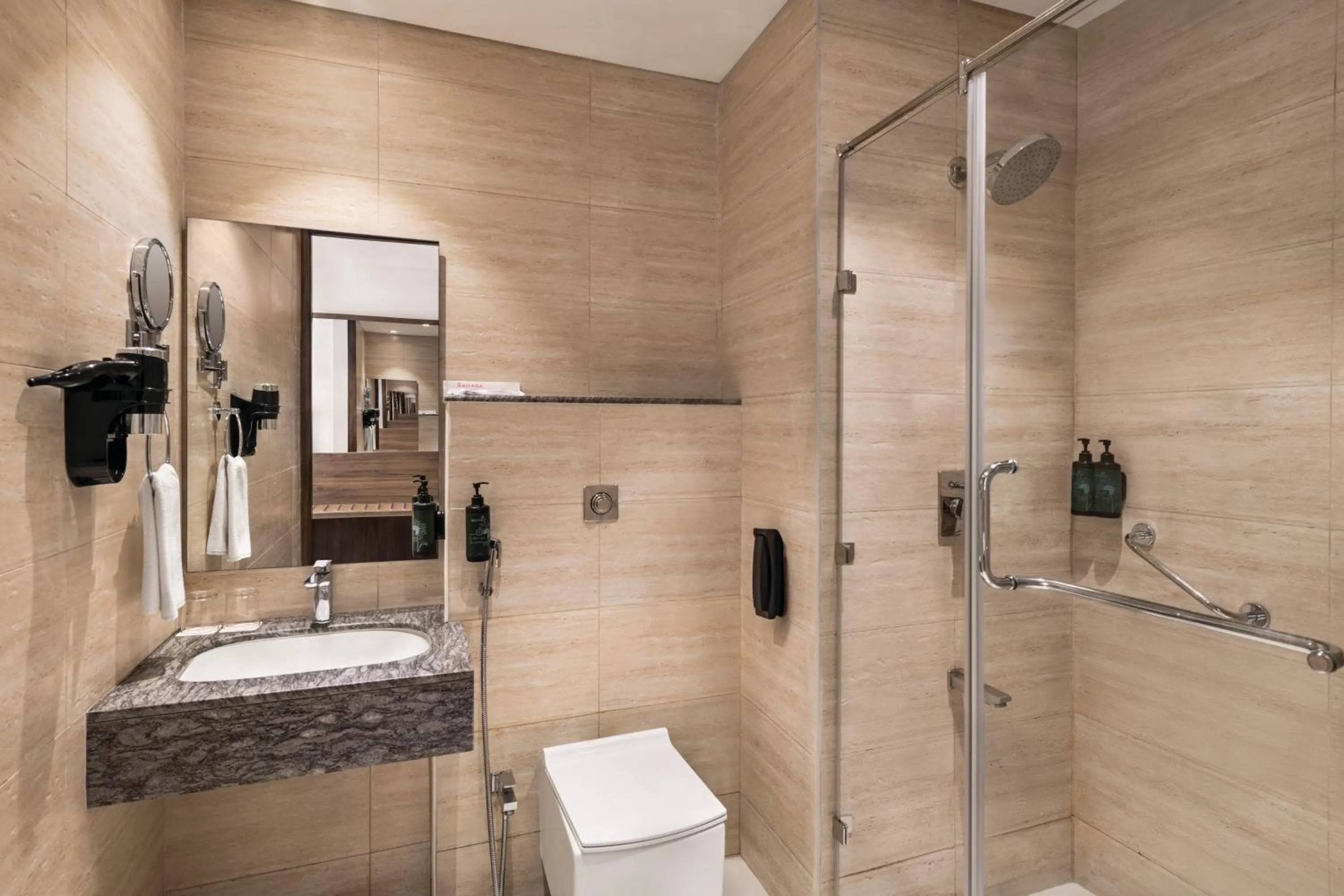 Bathroom in Ramada by Wyndham Ahmedabad Narendra Modi Stadium Motera