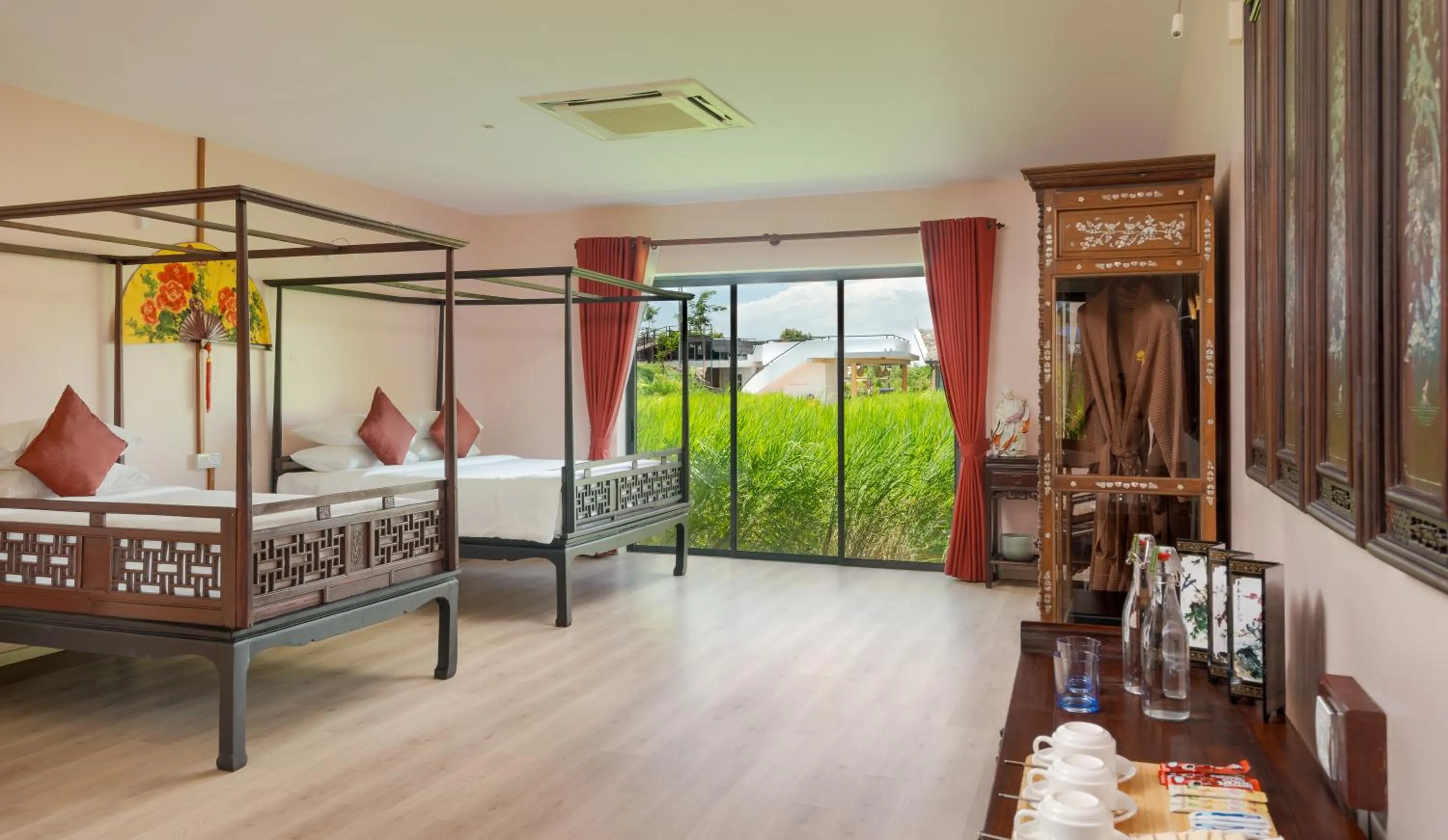 Bed in Komsan Kampot Resort