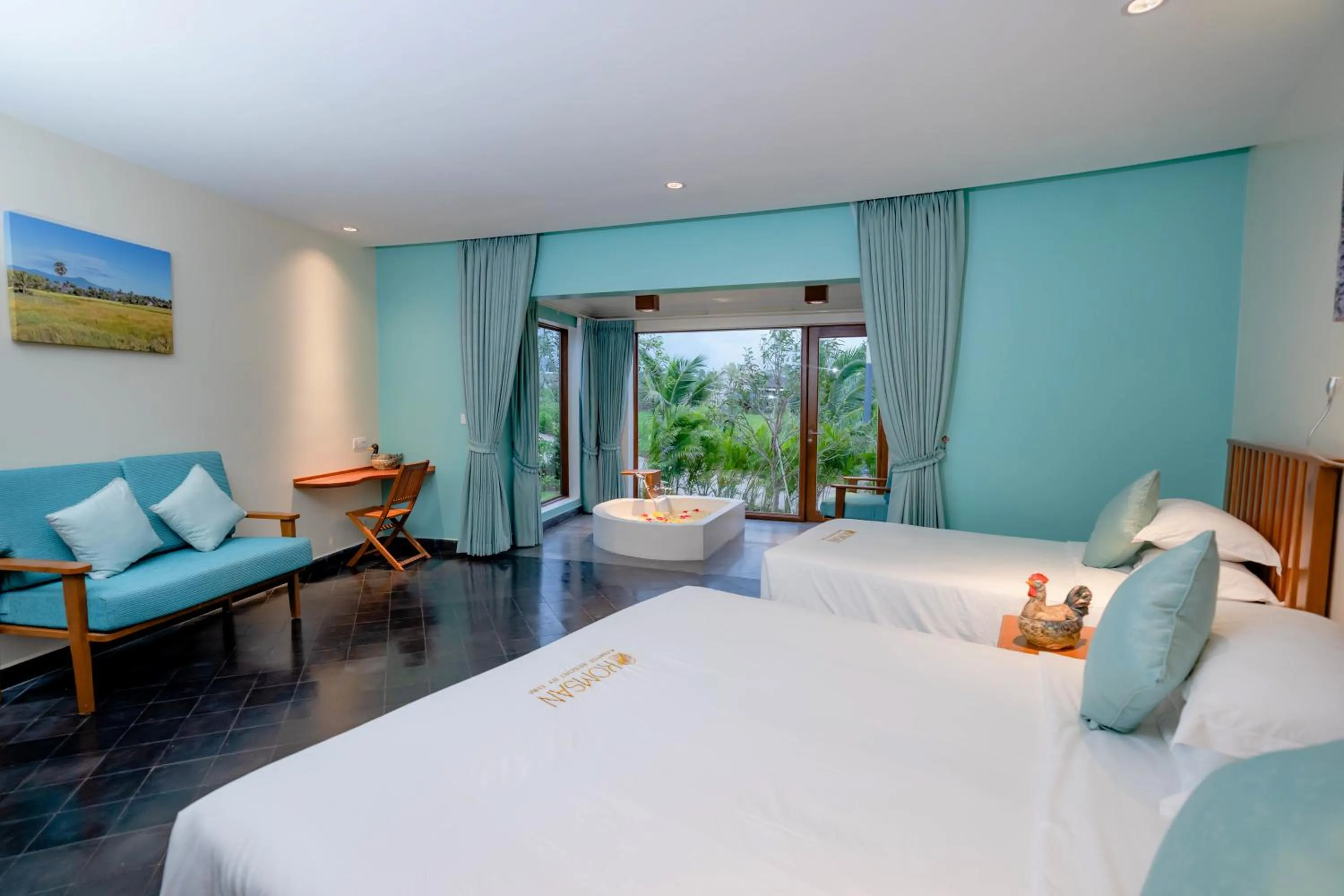 Bed in Komsan Kampot Resort