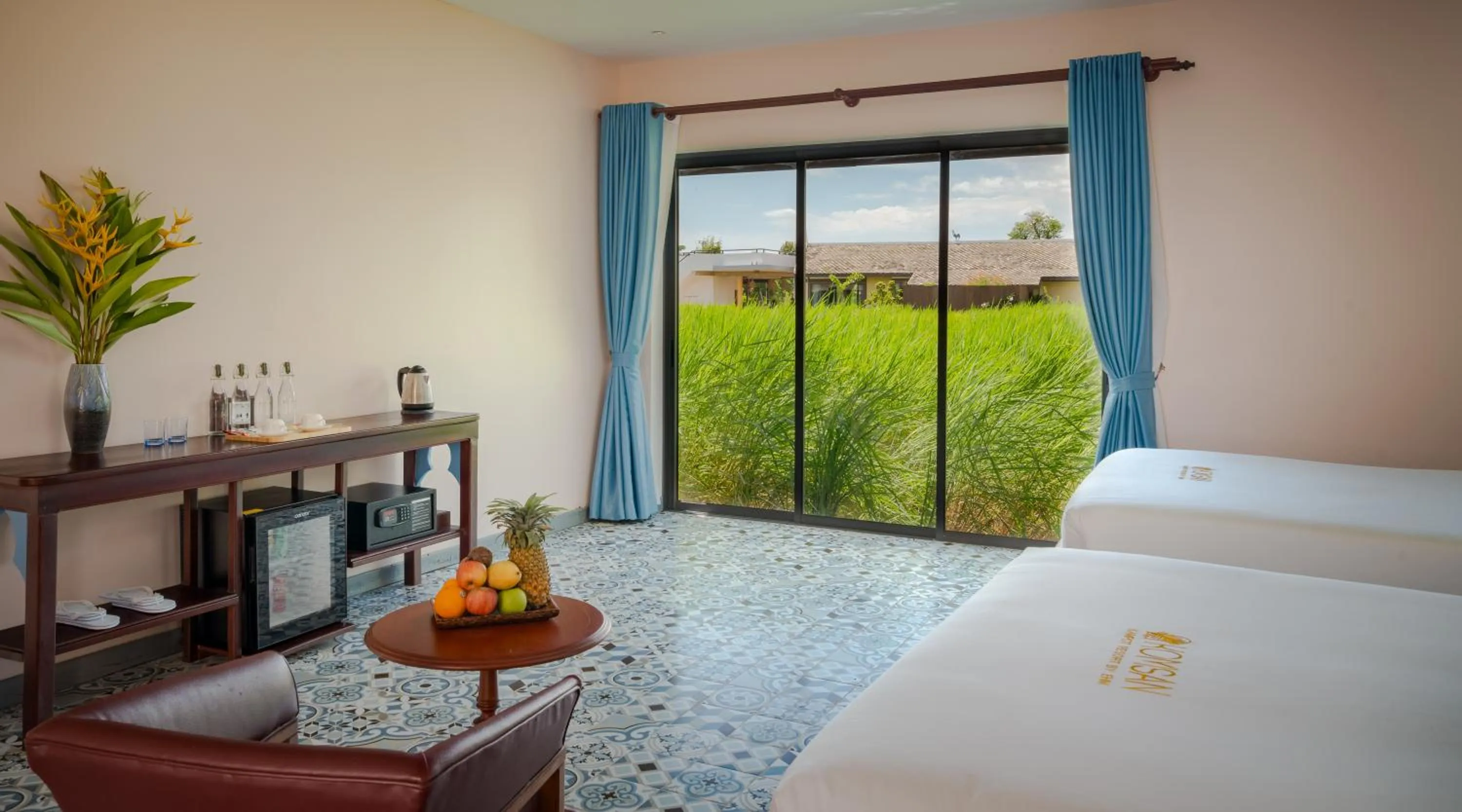 Bed in Komsan Kampot Resort