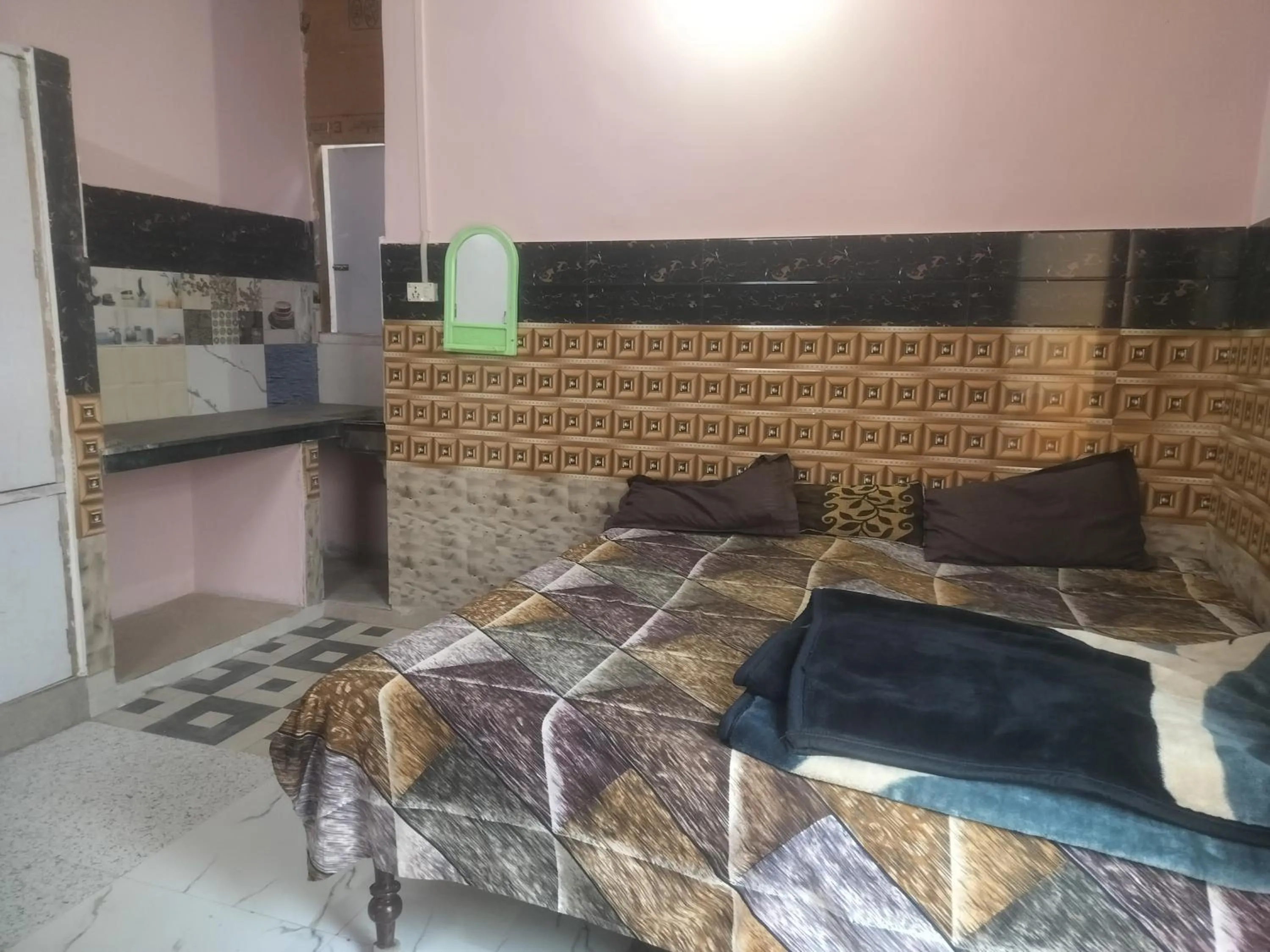Bed in Shri Krishna Kunj homestay