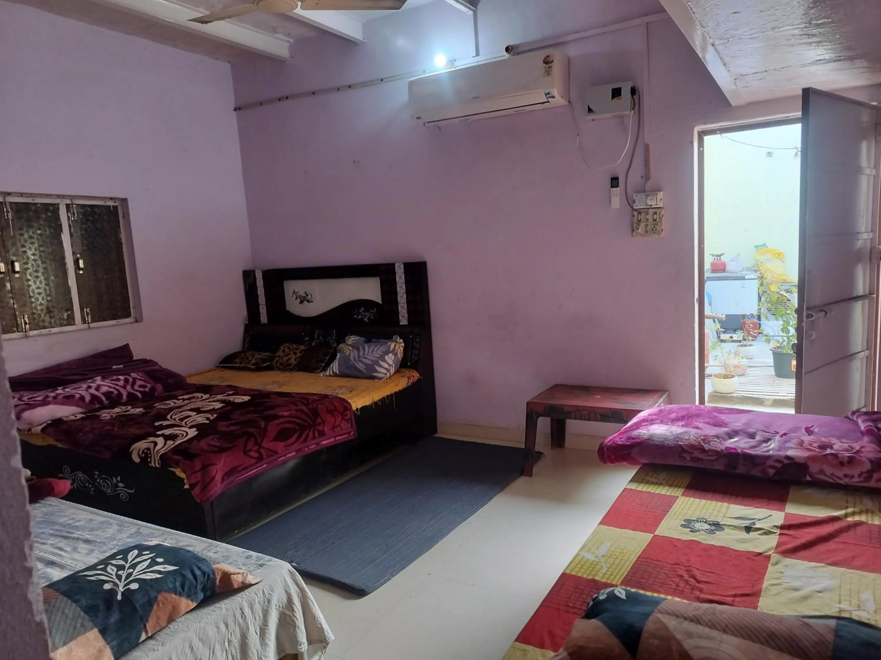 Bed in Shri Krishna Kunj homestay