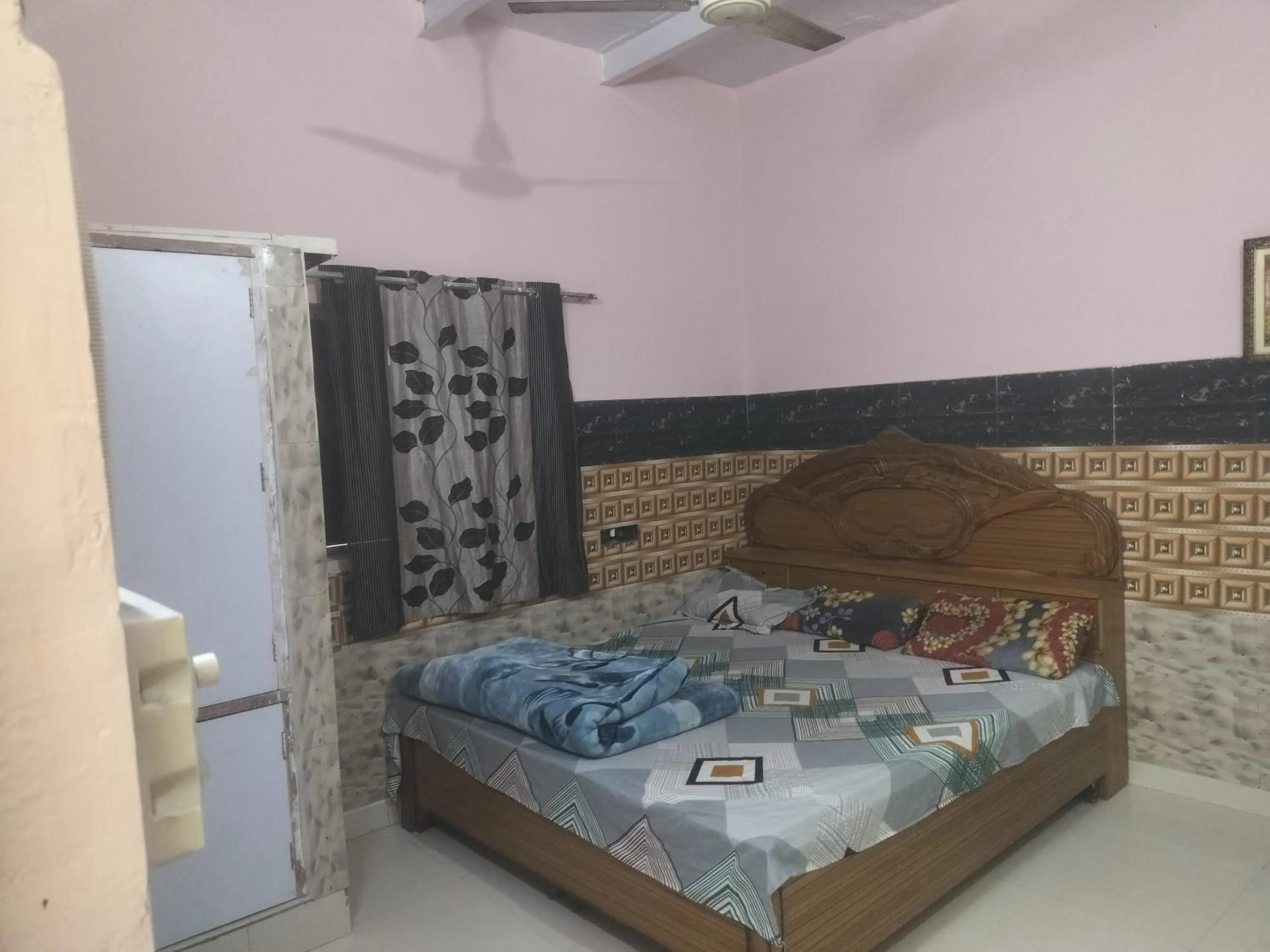 Bed in Shri Krishna Kunj homestay