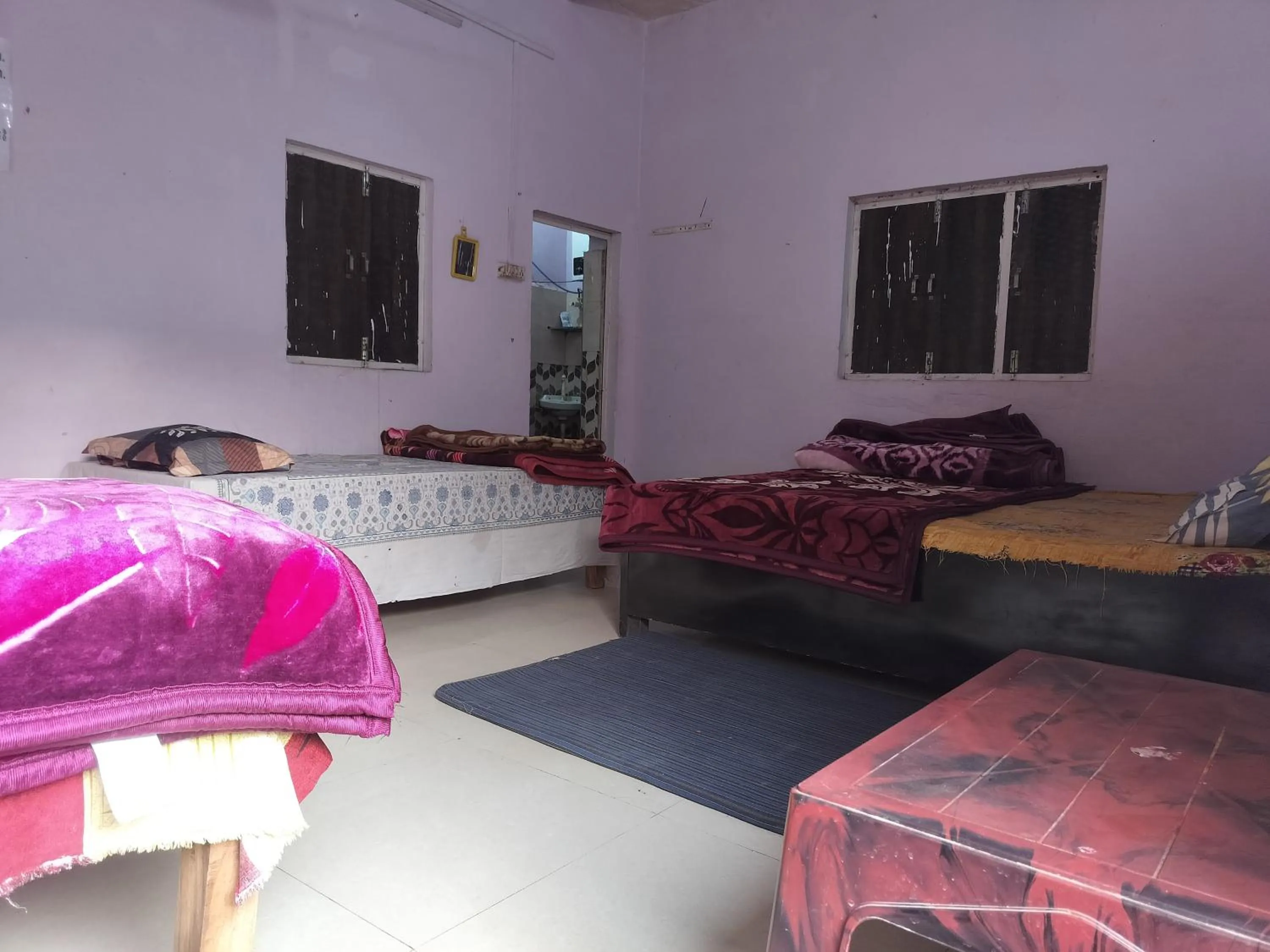 Bed in Shri Krishna Kunj homestay