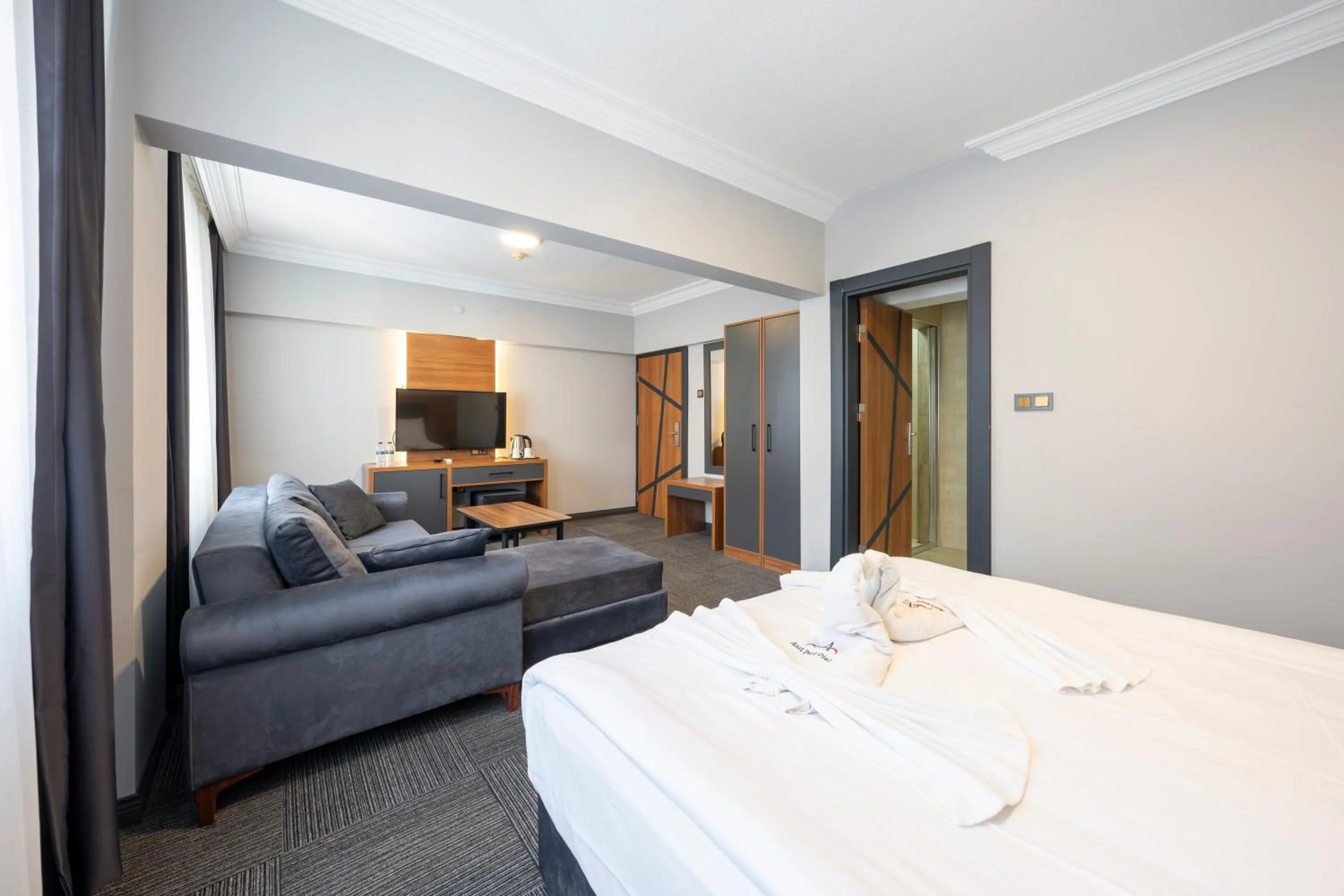 Photo of the whole room, Bed in Maltepe MANHATTAN OTEL