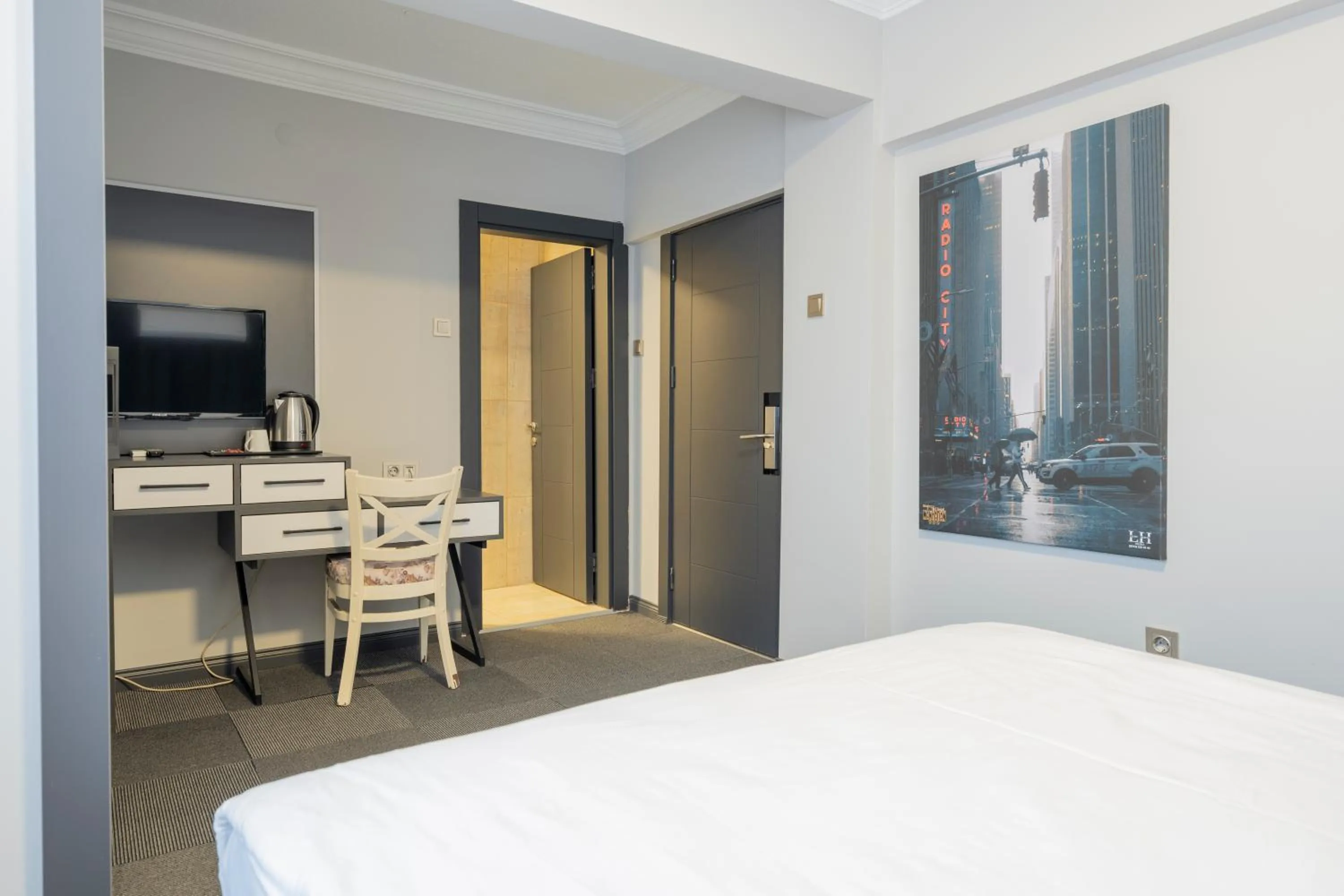 Photo of the whole room, Bed in Maltepe MANHATTAN OTEL