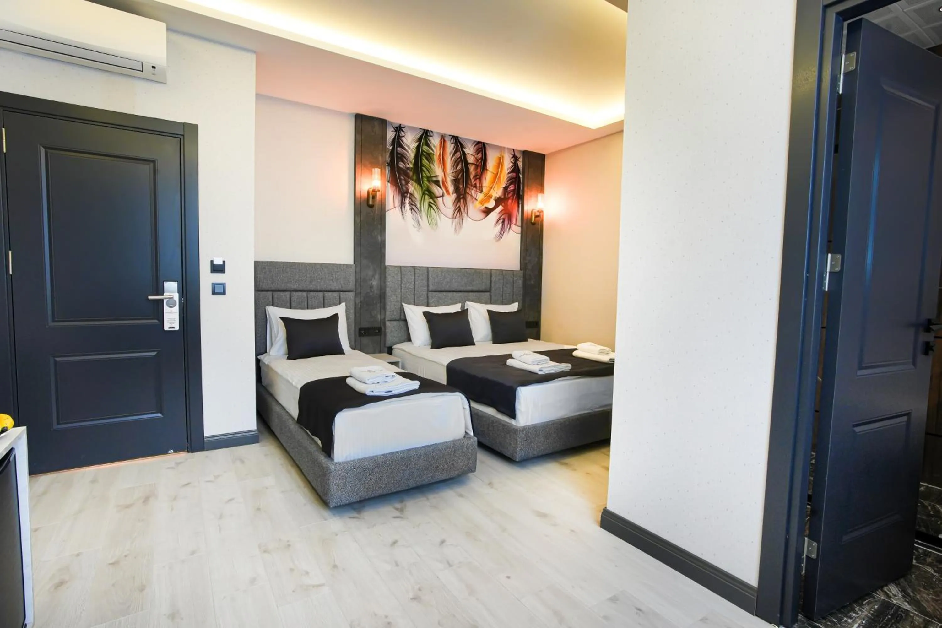 Bed in Comfort Point Two Hotel