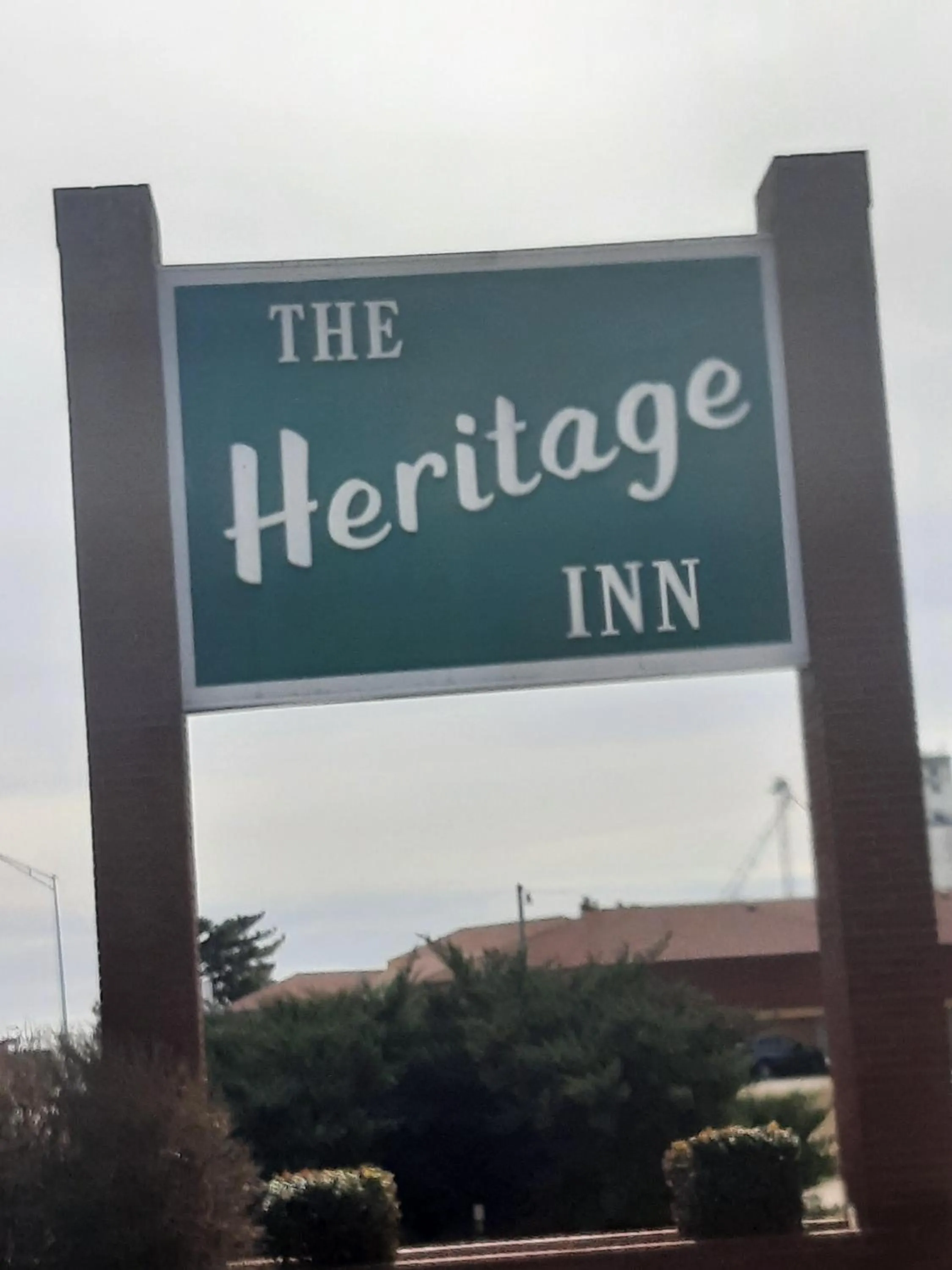 Property logo or sign in Heritage Inn