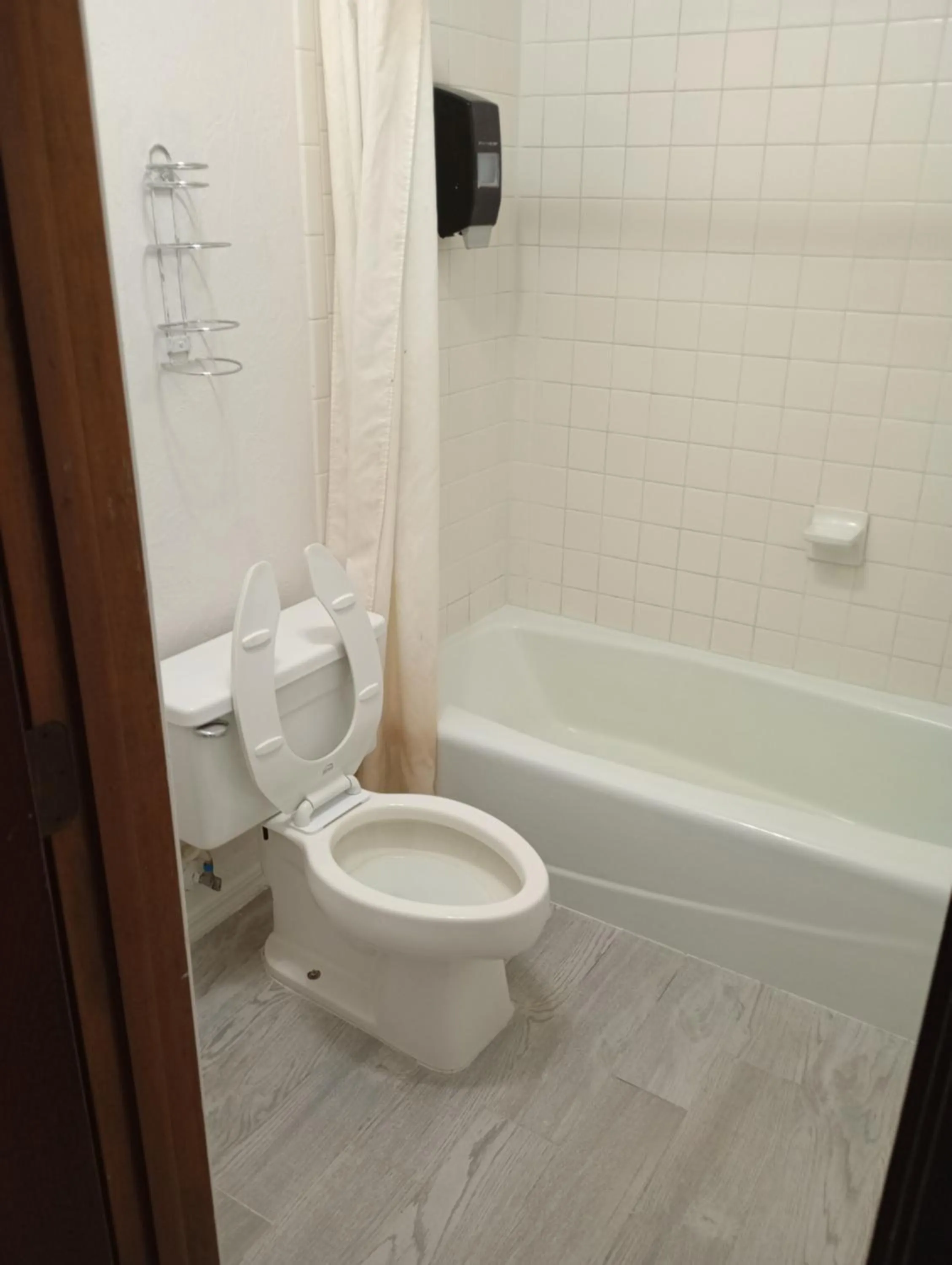 Toilet in Heritage Inn