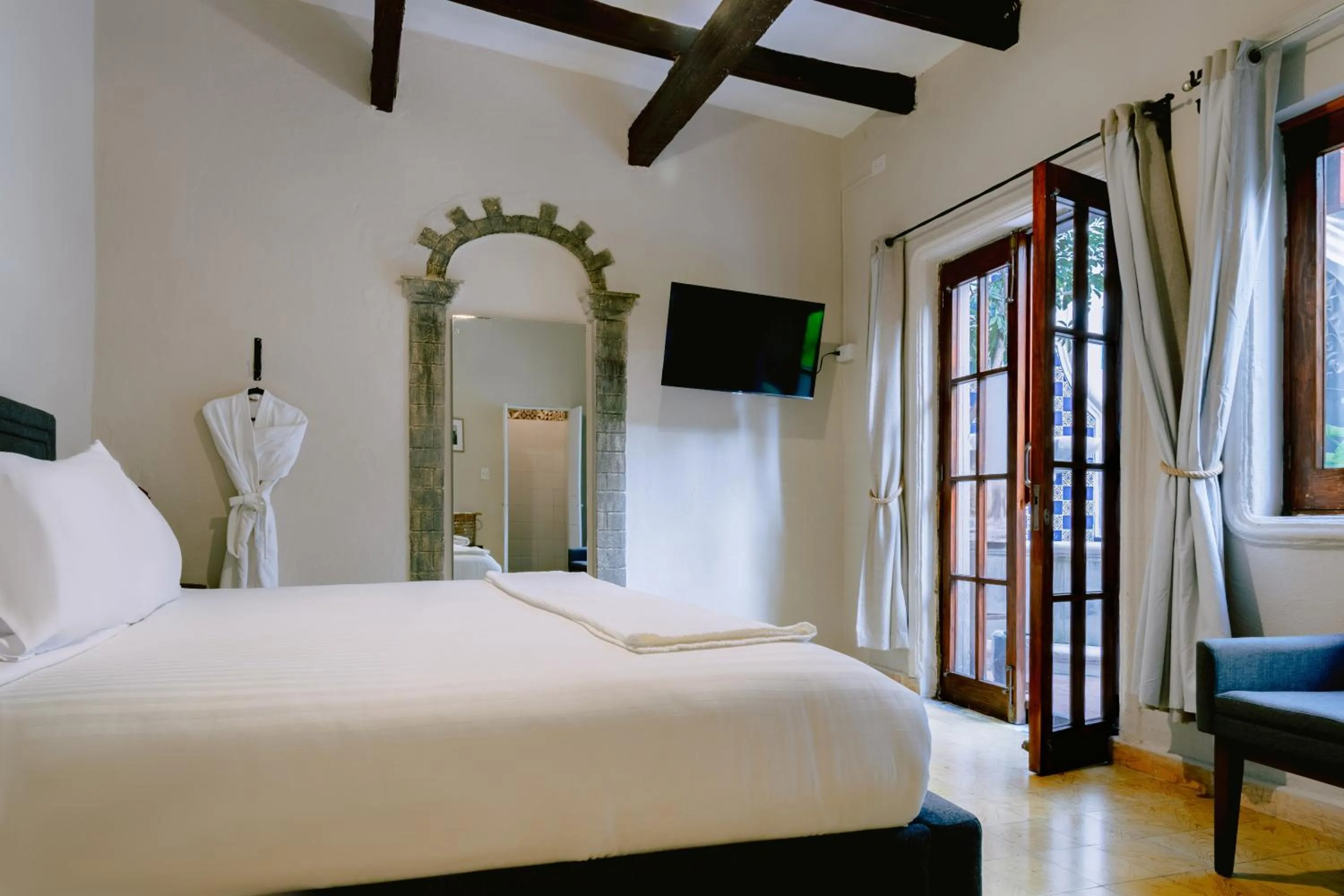 Photo of the whole room, Bed in Te Amo Hotel Boutique