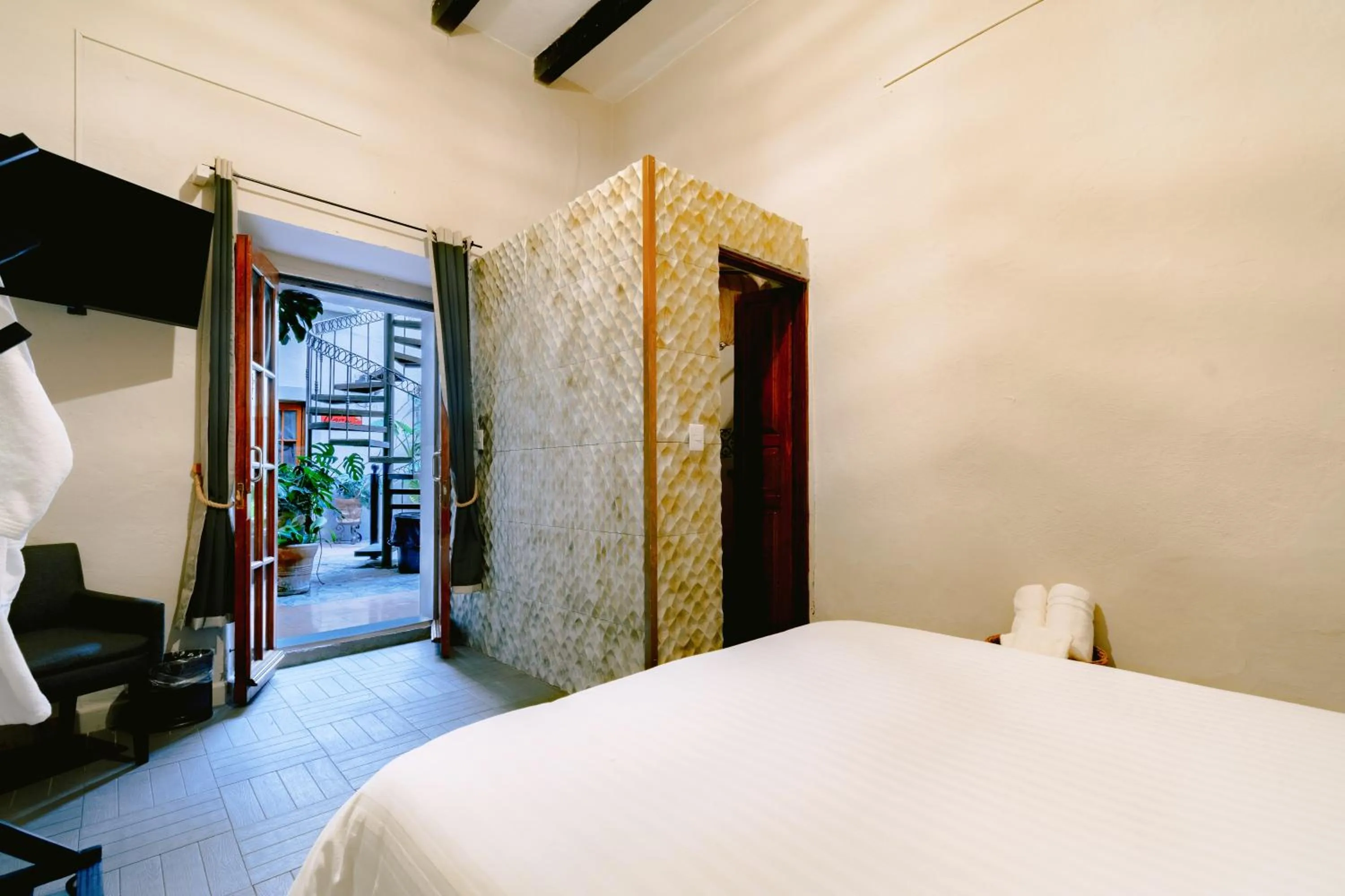 Photo of the whole room, Bed in Te Amo Hotel Boutique