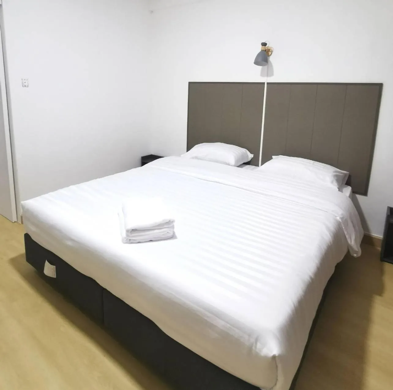 Bed in Ratanasiri Hotel