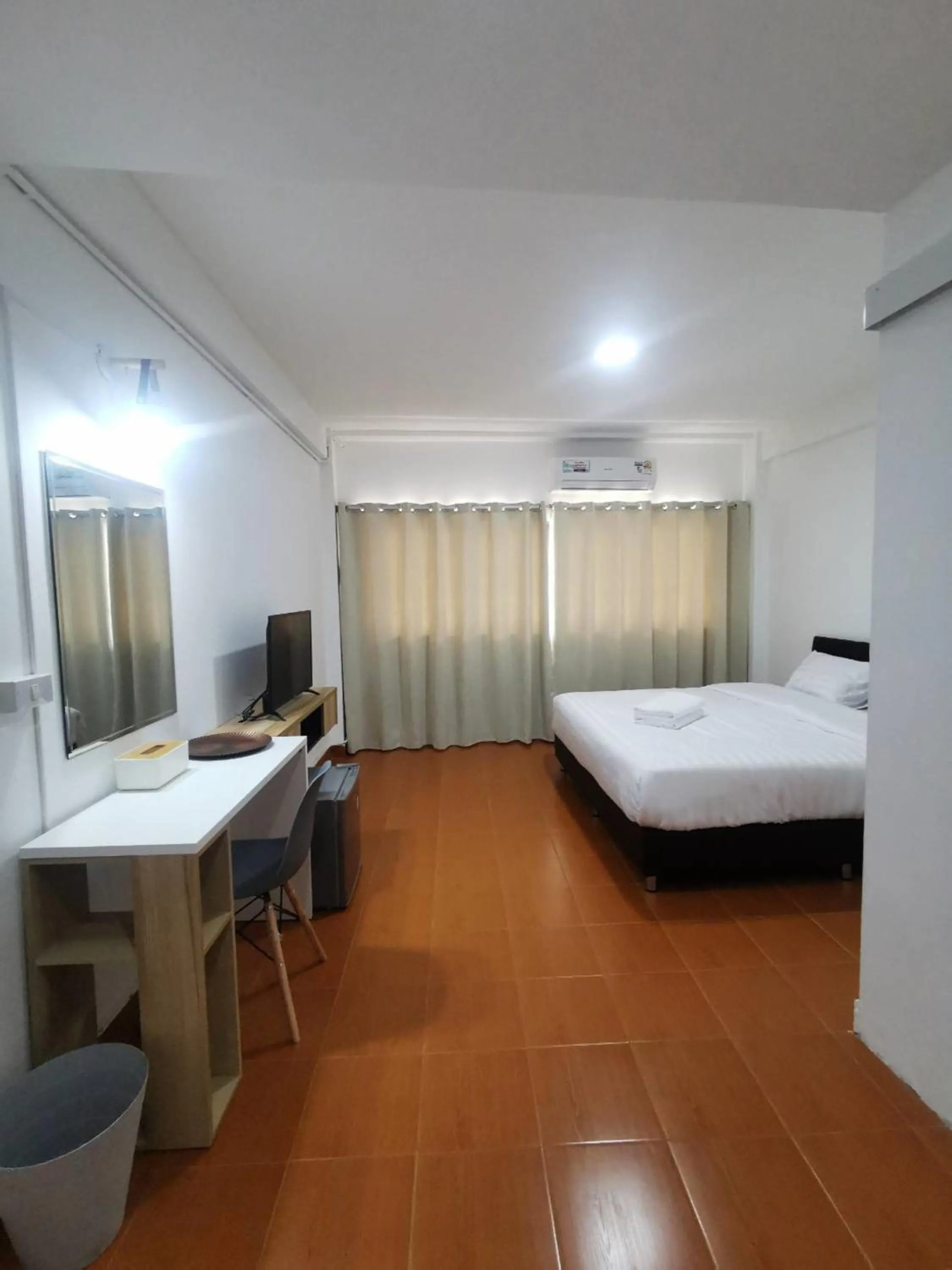 Bed in Ratanasiri Hotel