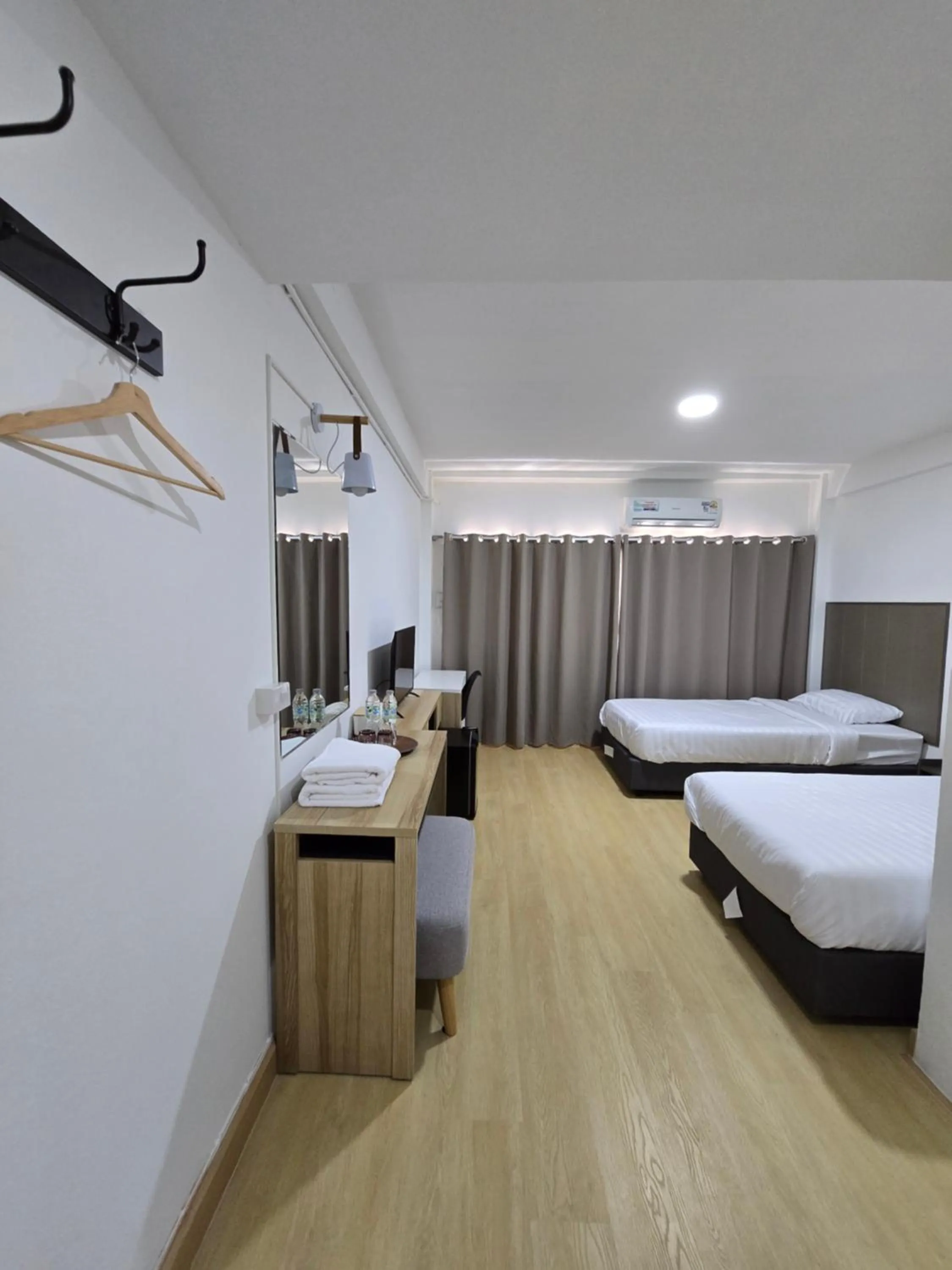 Bed in Ratanasiri Hotel