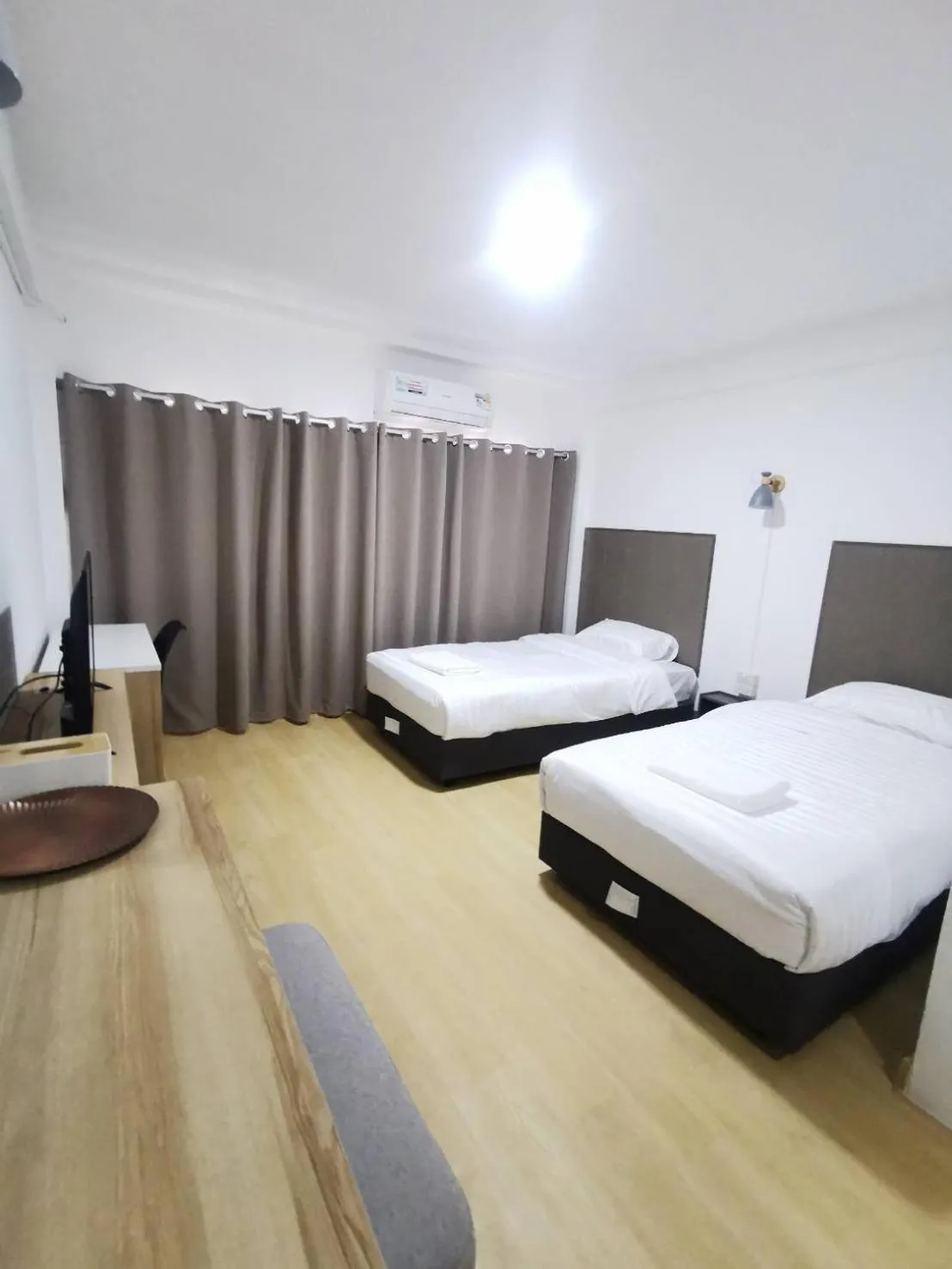 Bed in Ratanasiri Hotel