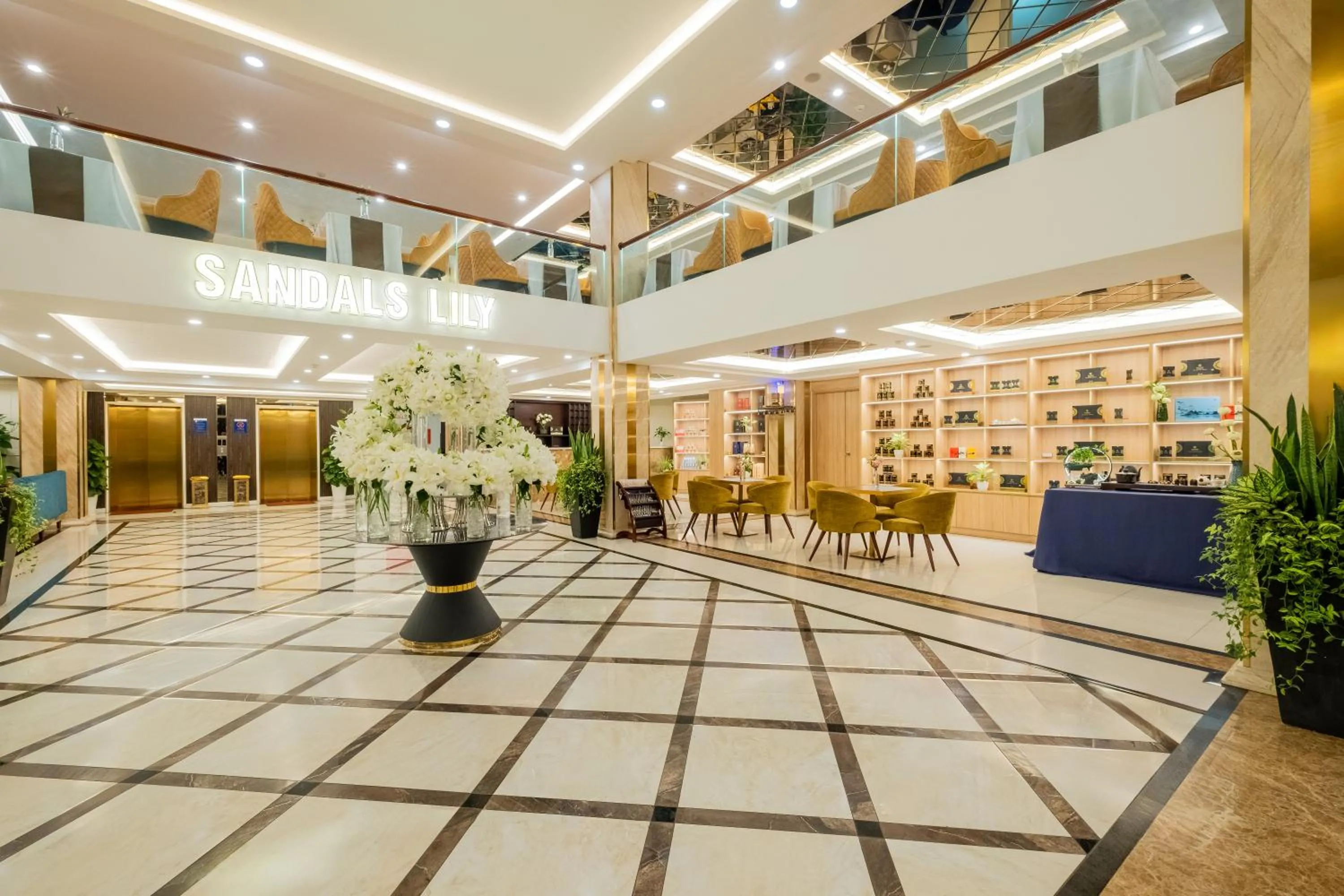 Communal lounge/ TV room in Sandals Lily Hotel