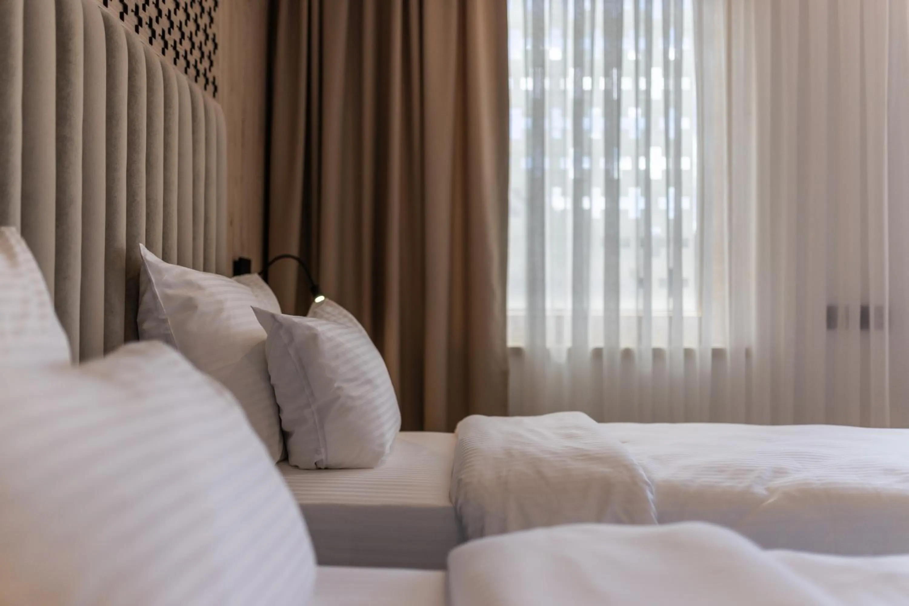 Bed in Hotel Julian Alps