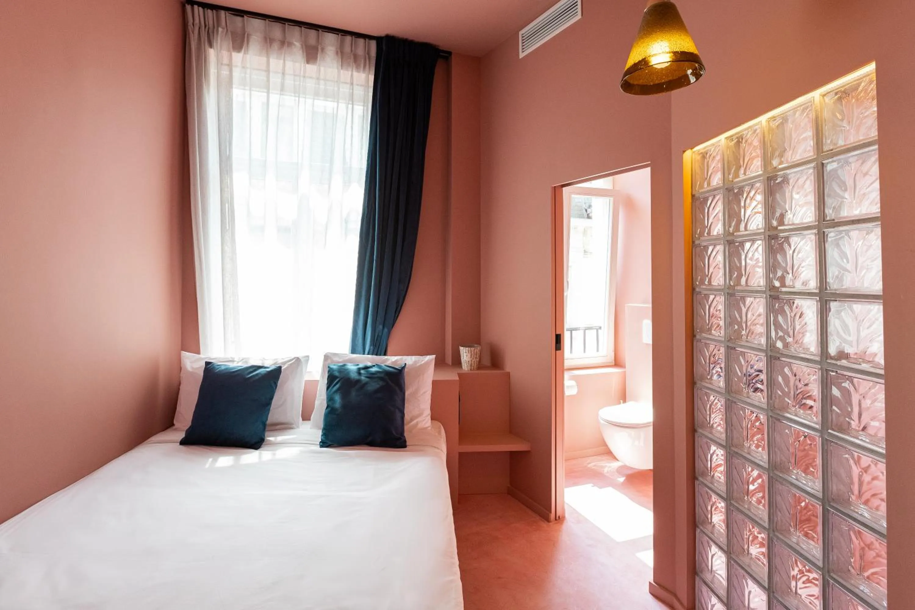 Bed in The Mila Hotel