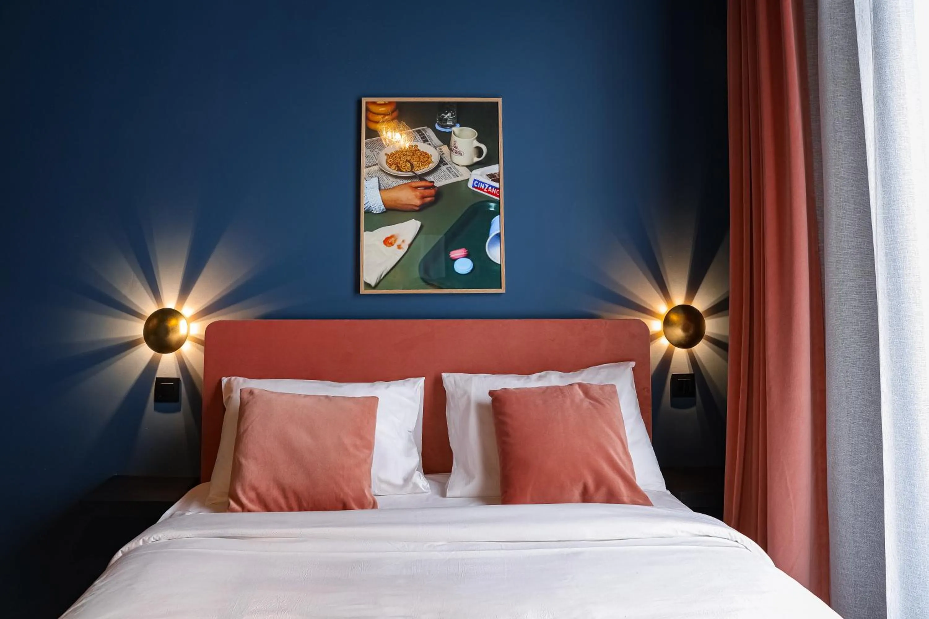 Bed in The Mila Hotel