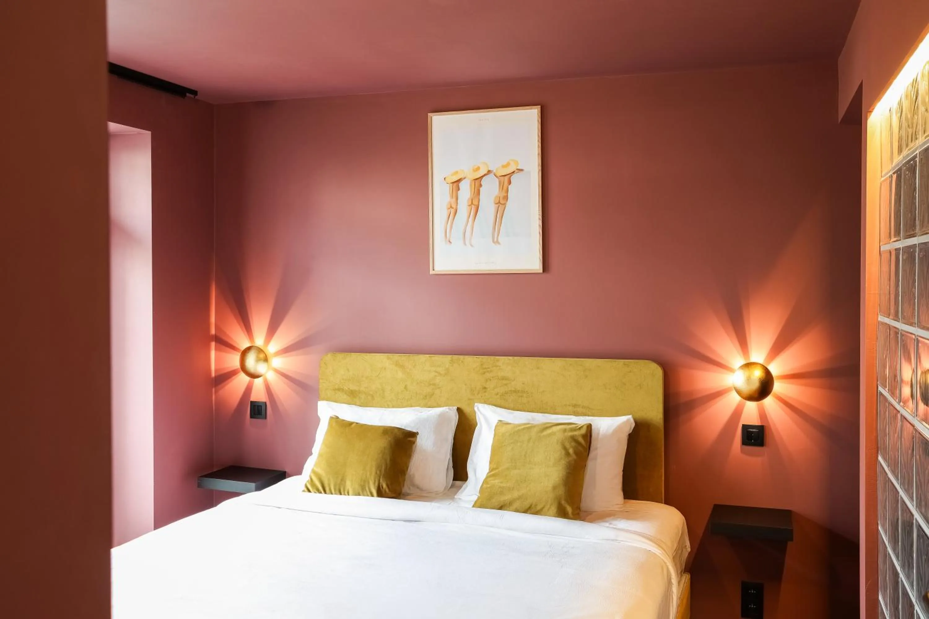 Bed in The Mila Hotel