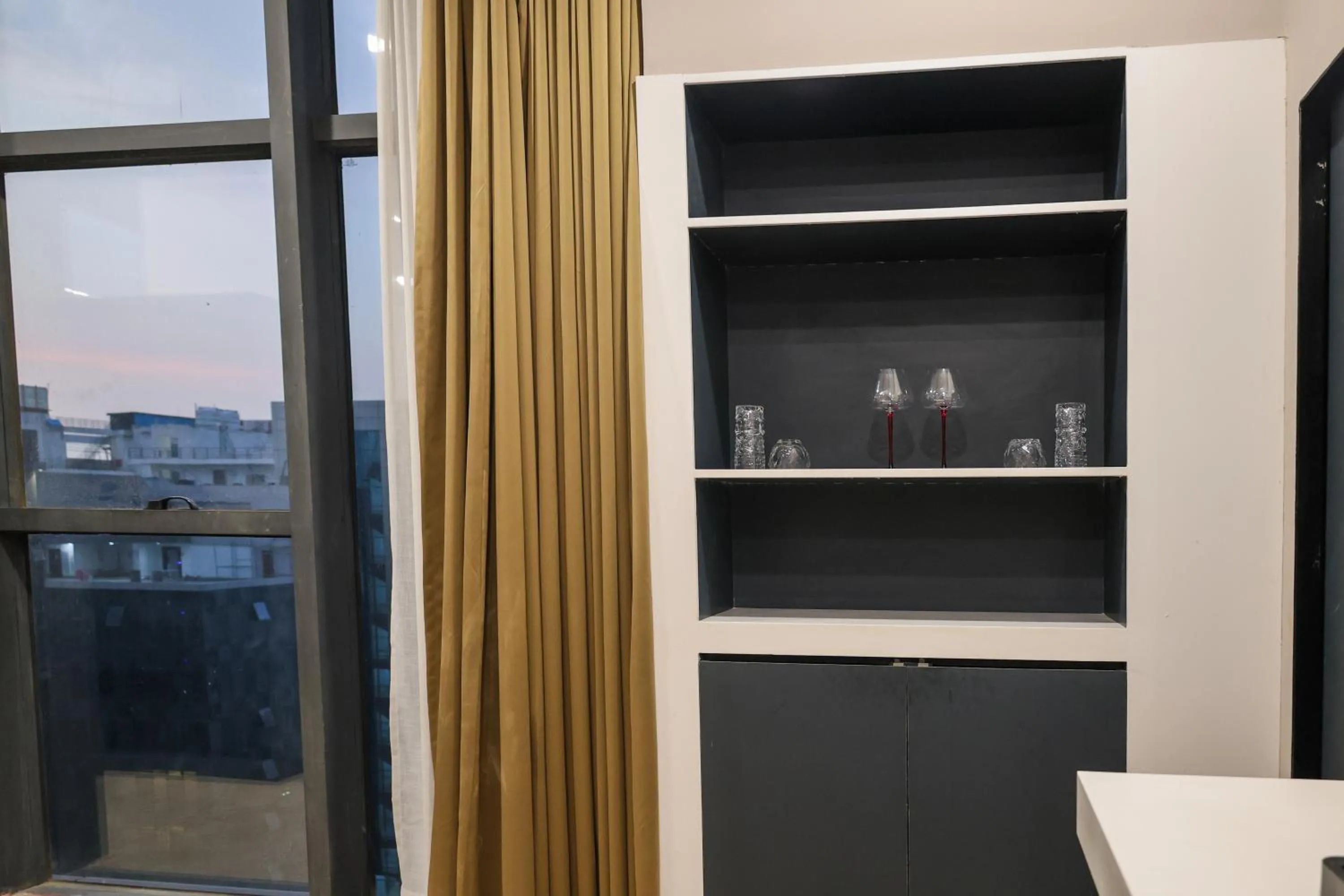 Kitchen or kitchenette in Aquila Grand Suites - Noida Sector 136