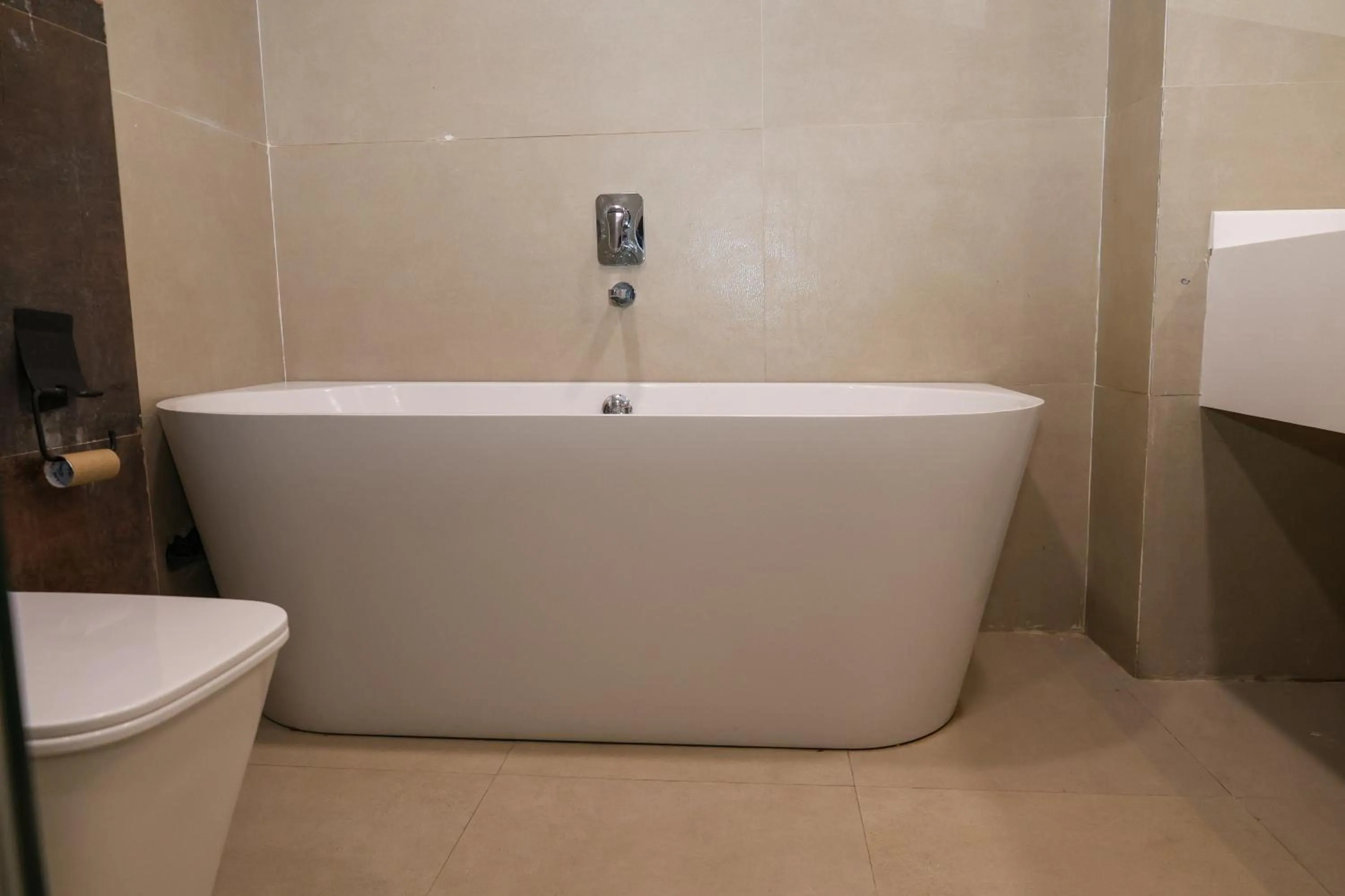 Bath in Aquila Grand Suites - Noida Sector 136