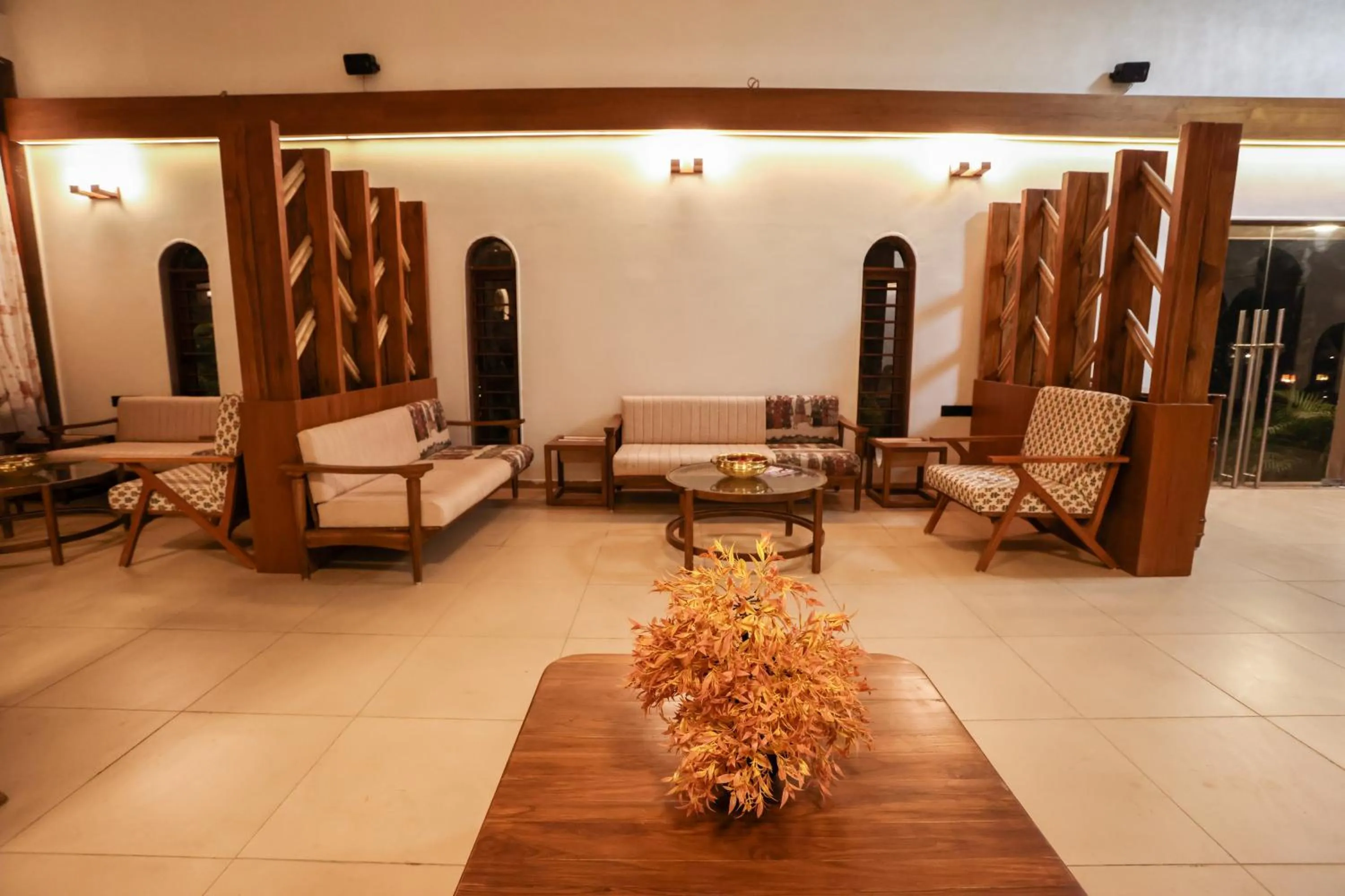 Seating area in Le Casa Lion Resort A Premium Resort In Sasan Gir