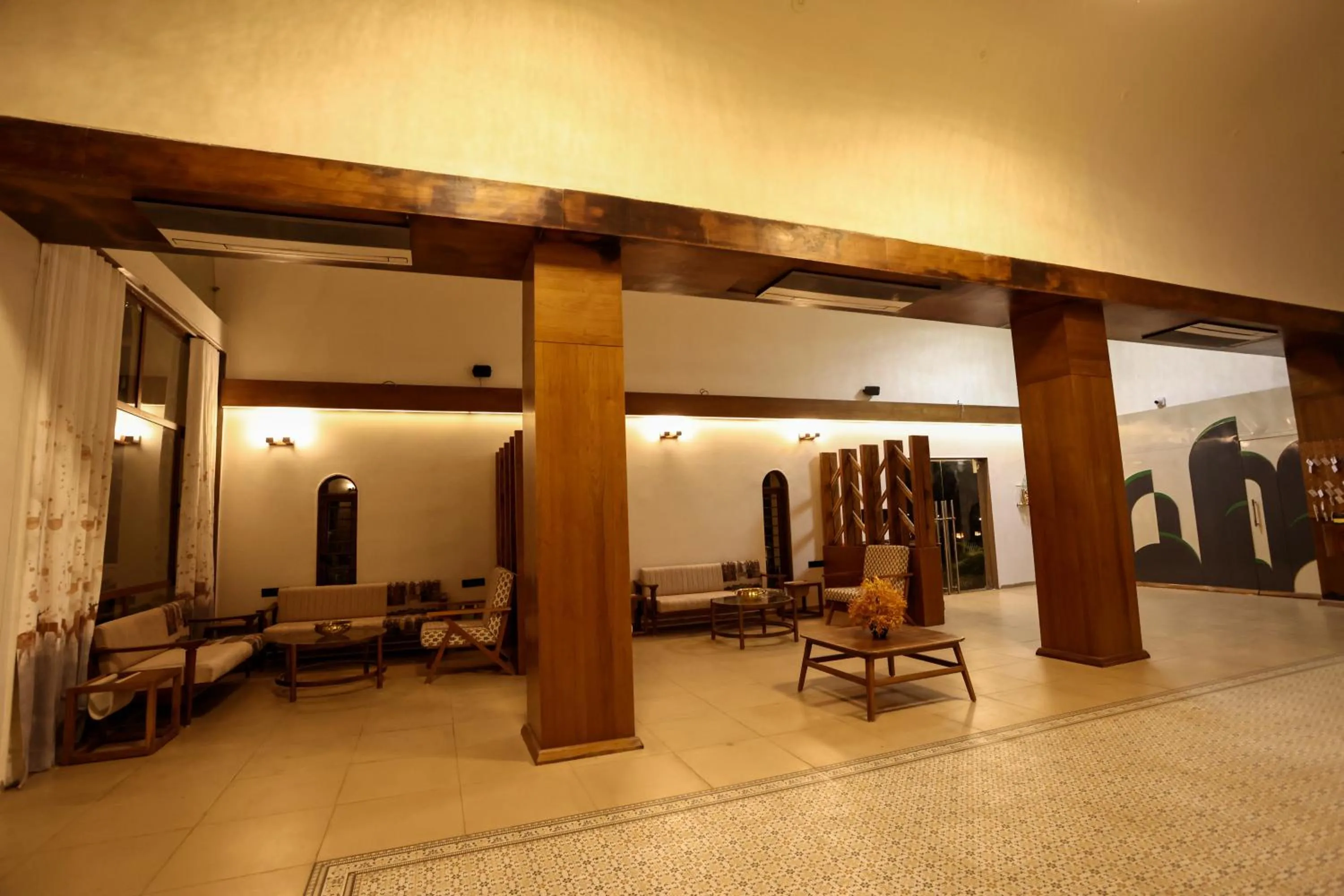 Seating area in Le Casa Lion Resort A Premium Resort In Sasan Gir