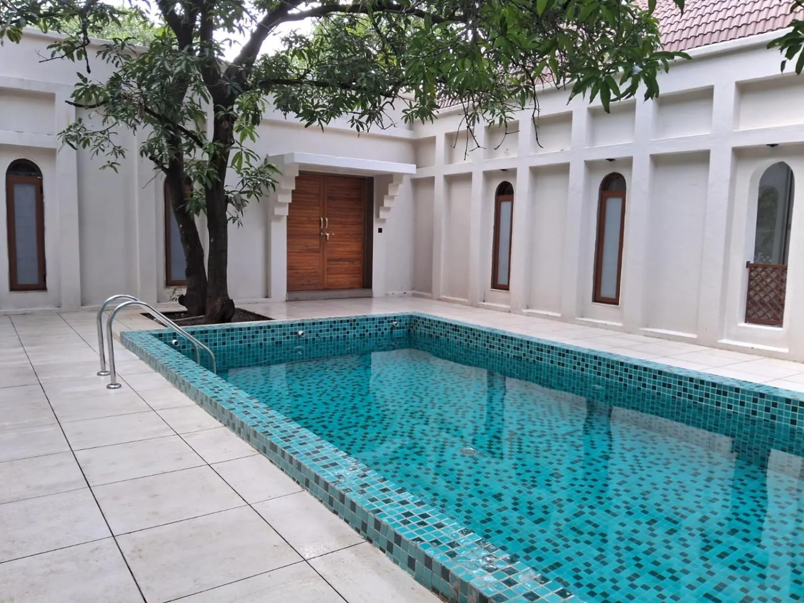 Swimming pool in Le Casa Lion Resort A Premium Resort In Sasan Gir