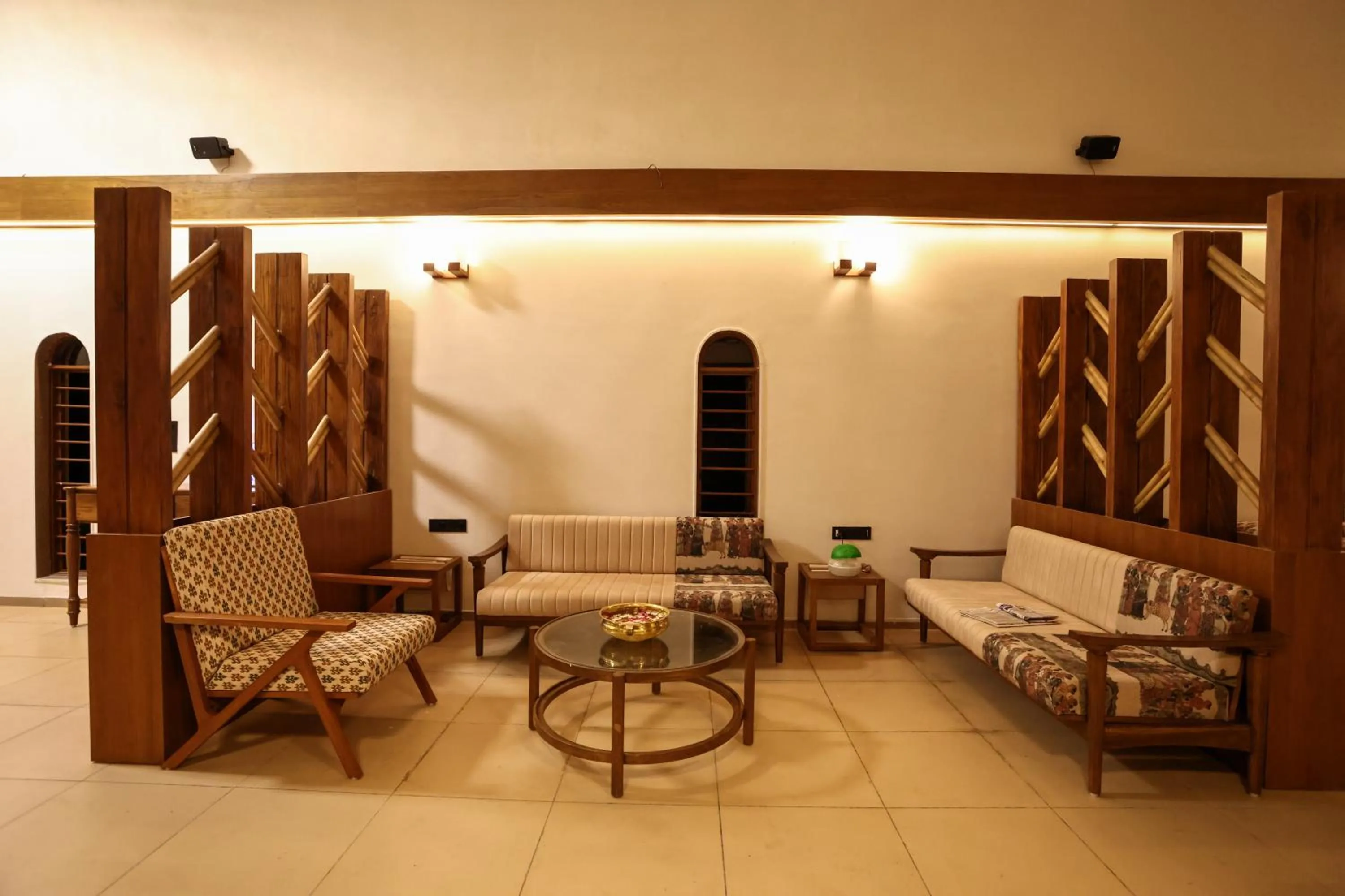 Seating area in Le Casa Lion Resort A Premium Resort In Sasan Gir