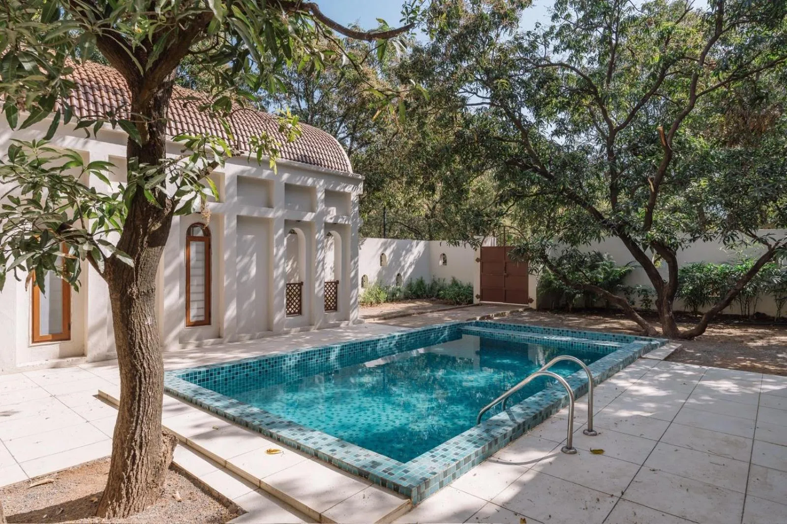 Swimming pool in Le Casa Lion Resort A Premium Resort In Sasan Gir